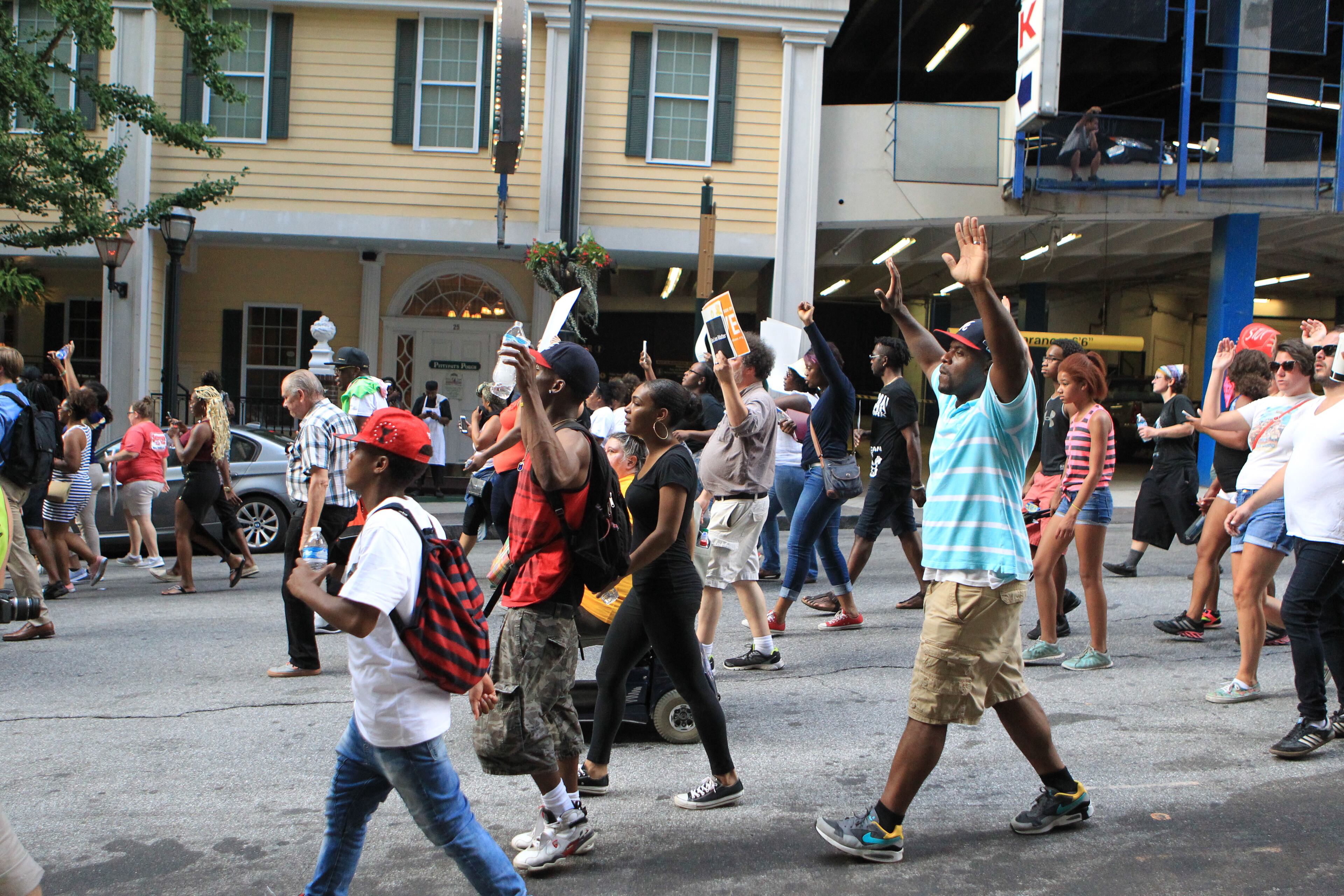 Protesters marched from the Center for Civil and Human Rights on Ivan Allen Jr. Boulevard to the CNN Center on Marietta St in response to recent shootings and civil rights issues. The rallies and march was sponsored by the NAACP and Black Lives Matter.