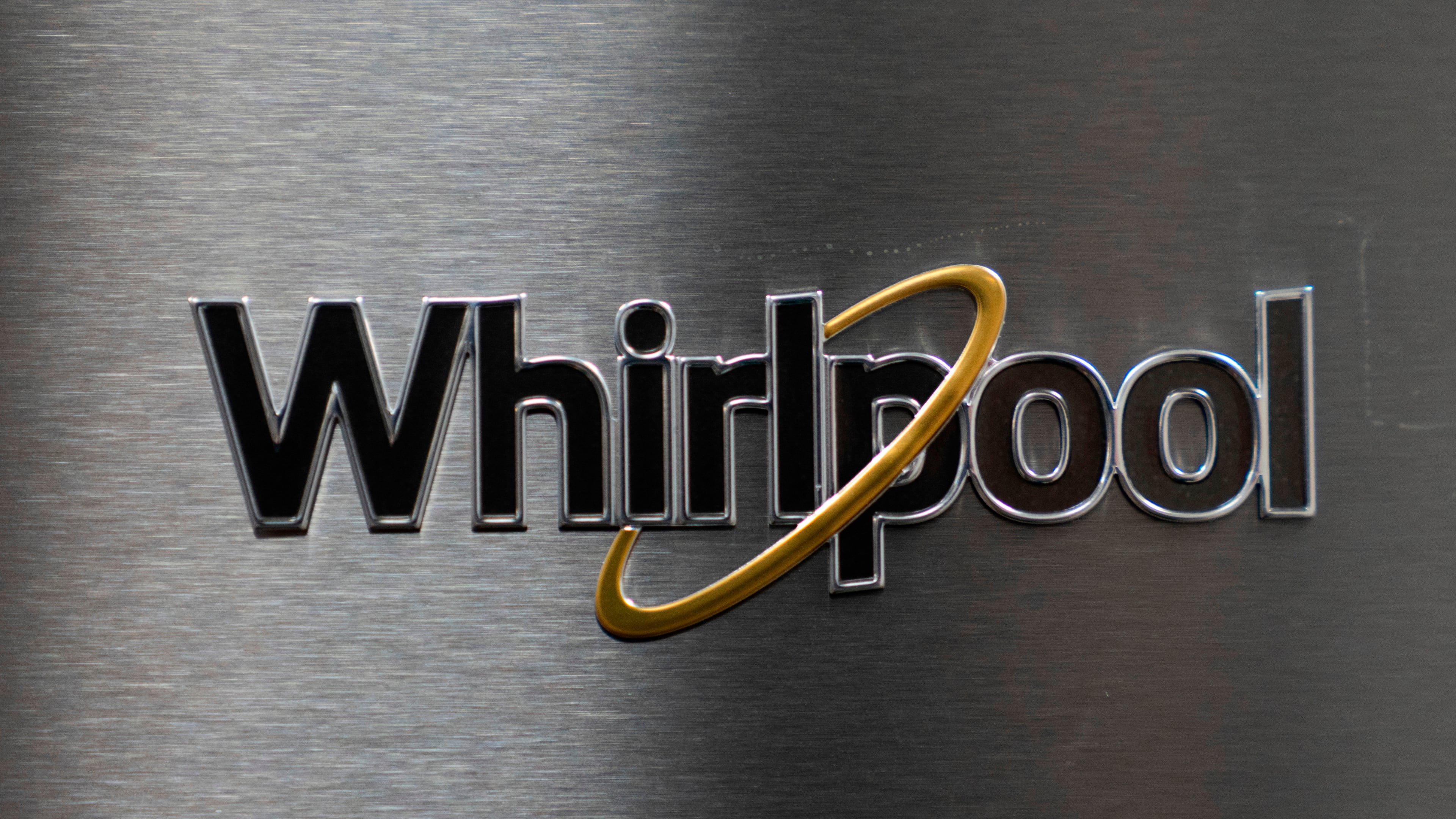 FILE - A logo for Whirlpool is seen at Riegelmann's Appliance on April 3, 2025, in Gresham, Ore. (AP Photo/Jenny Kane, File)