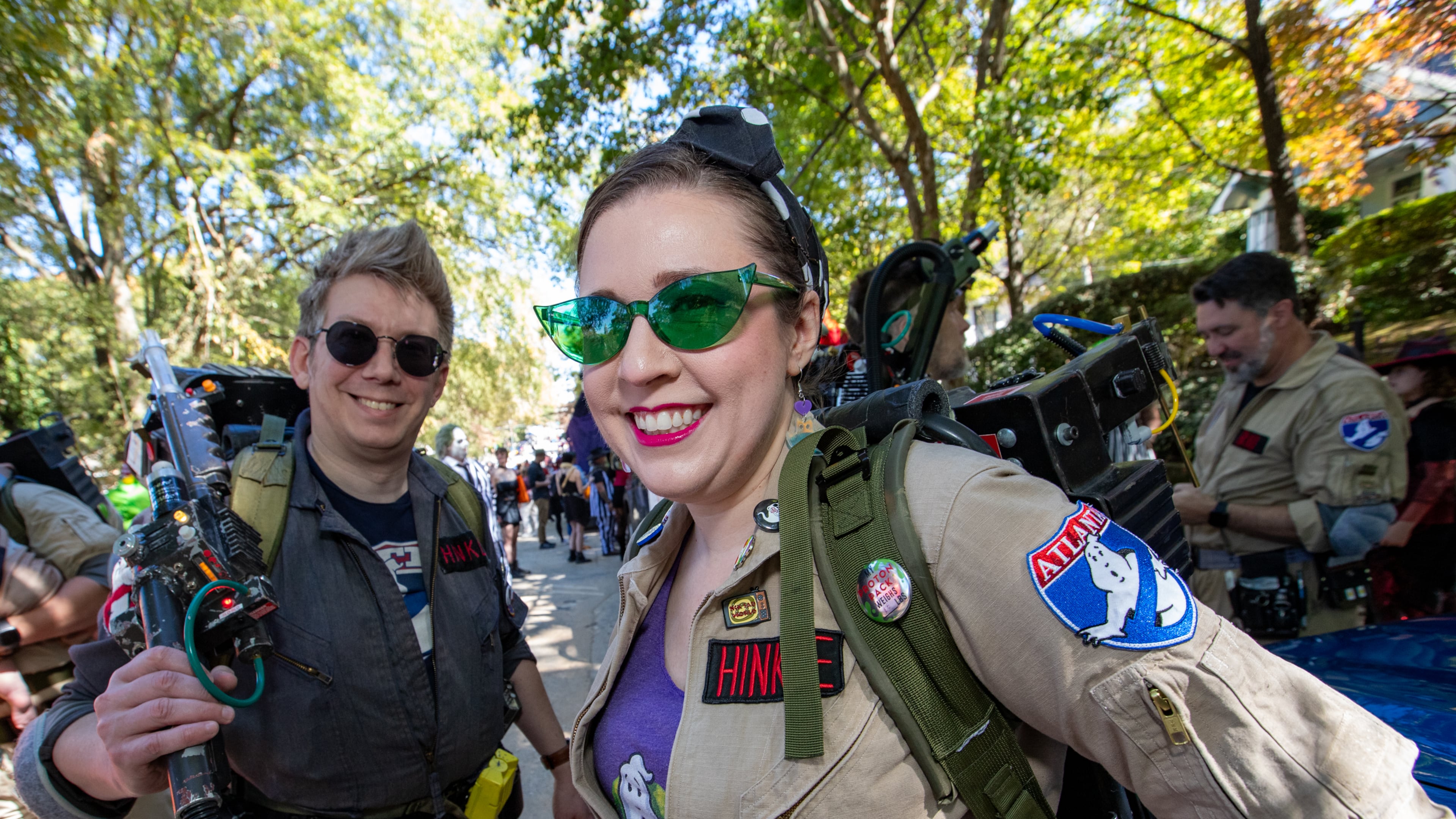 The Atlanta Ghostbusters, including Neil Hinkle and Carolyn Hinkle gather on Euclid Ave before the annual Little 5 Points Halloween Parade on Sunday, Oct 20, 2024. (Jenni Girtman for The Atlanta Journal-Constitution)