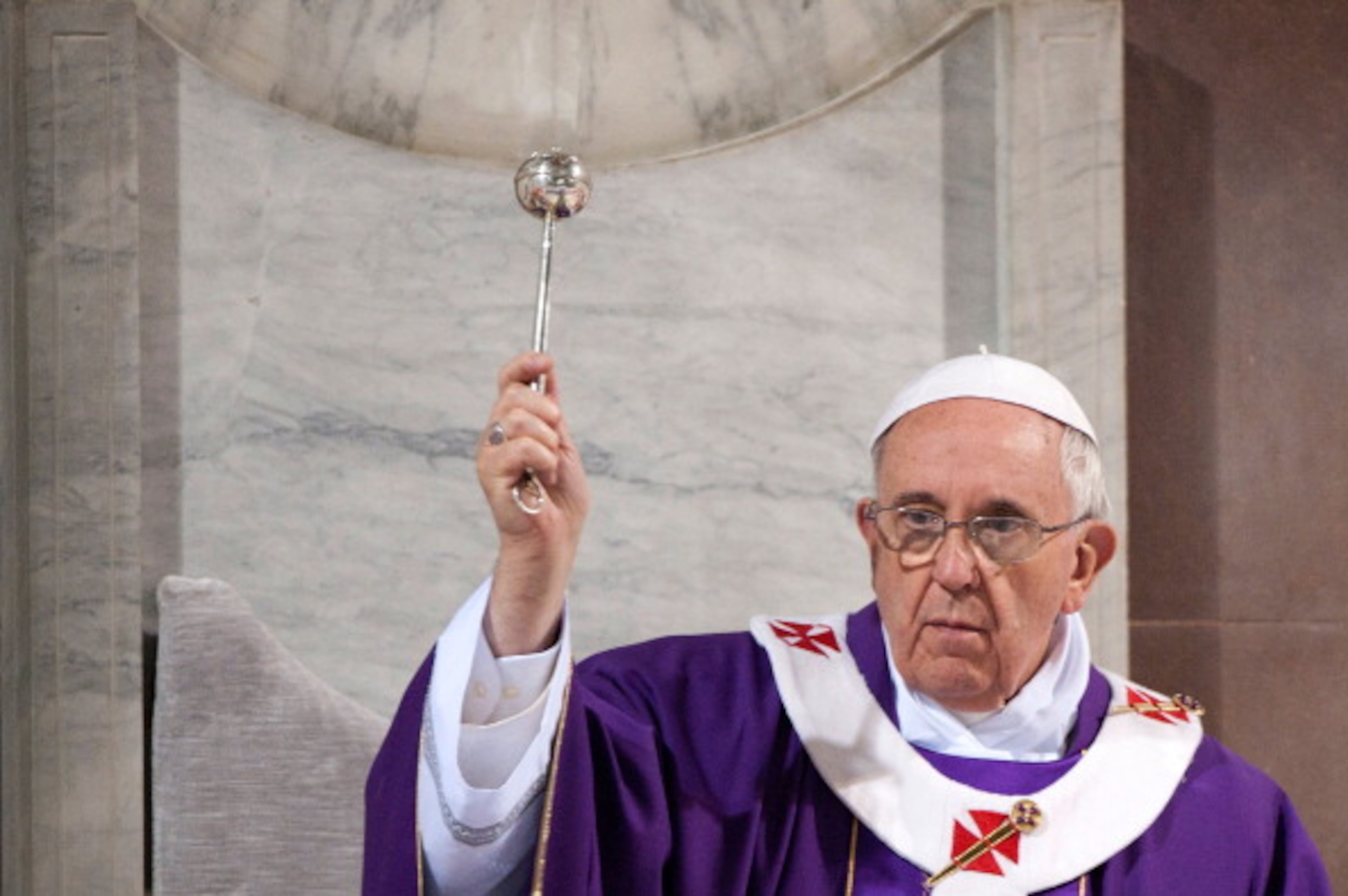 ROME, ITALY - MARCH 05: Pope Francis delivers his blessing during the Ash Wednesday service at Basilica di Santa Sabina on March 5, 2014 in Rome, Italy. Ash Wednesday opens the liturgical 40-day period of Lent, a time of prayer, fasting, penitence and alms giving leading up to Easter. (Photo by Vatican Pool/Getty Images)