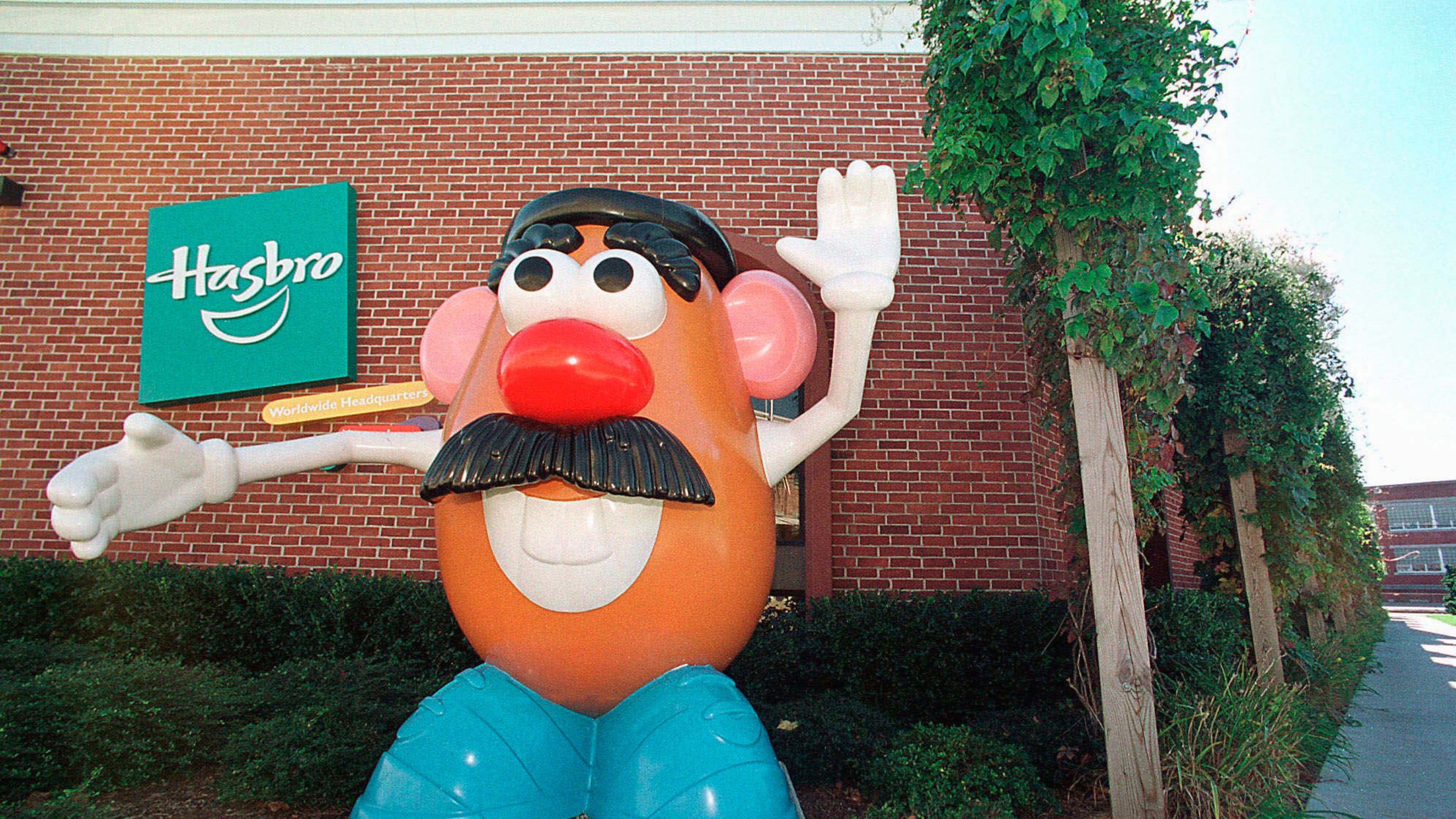 FILE - In this Oct. 12, 2000 file photo, a Mr. Potato Head statue stands outside the Hasbro, Inc. headquarters in Pawtucket, R.I. (AP Photo/Stew Milne, File)