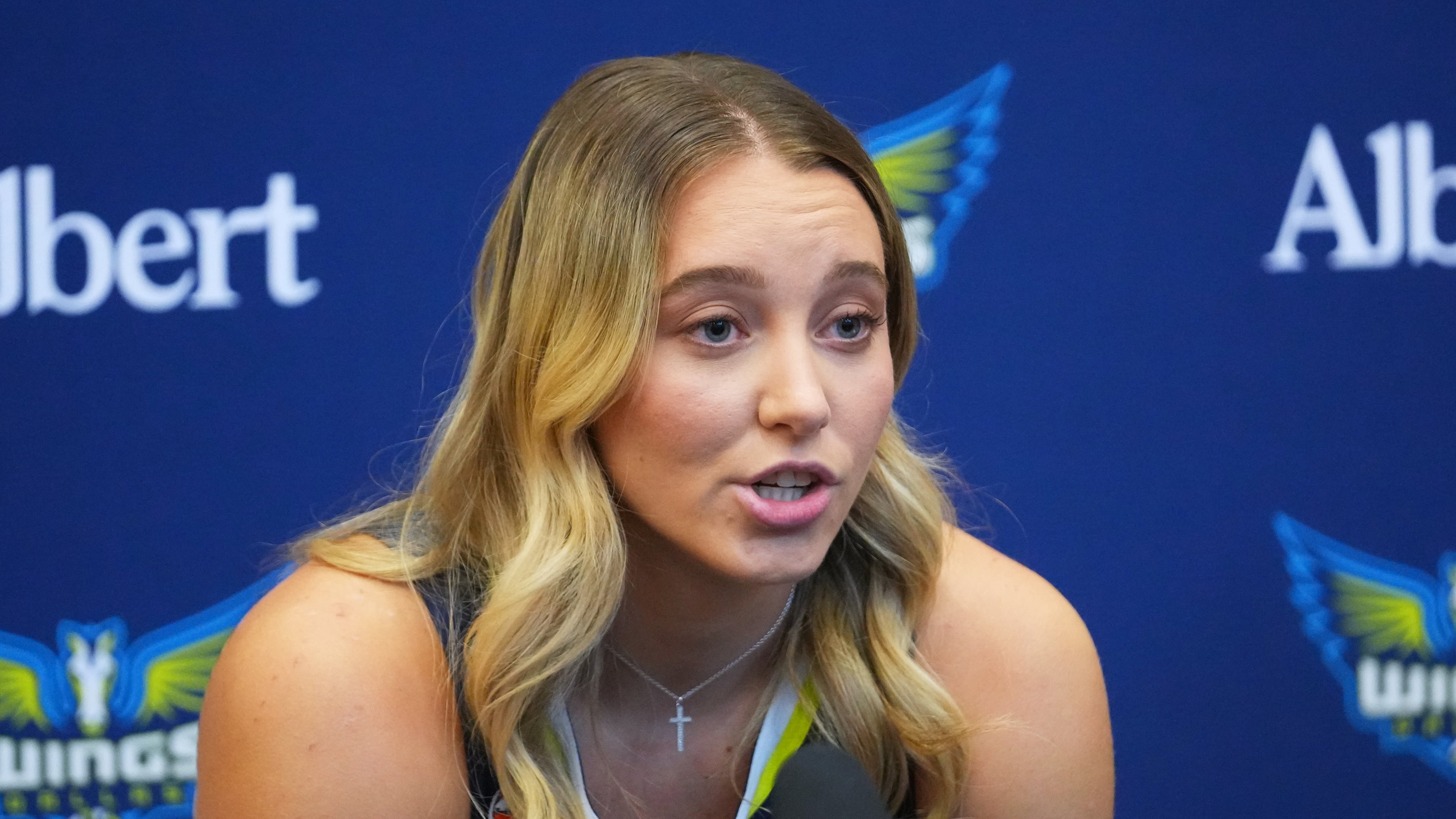 Dallas Wings' Paige Bueckers speaks to reporters during the team's WNBA basketball media day Monday, April 27, 2026, in Arlington, Texas. (AP Photo/Julio Cortez)