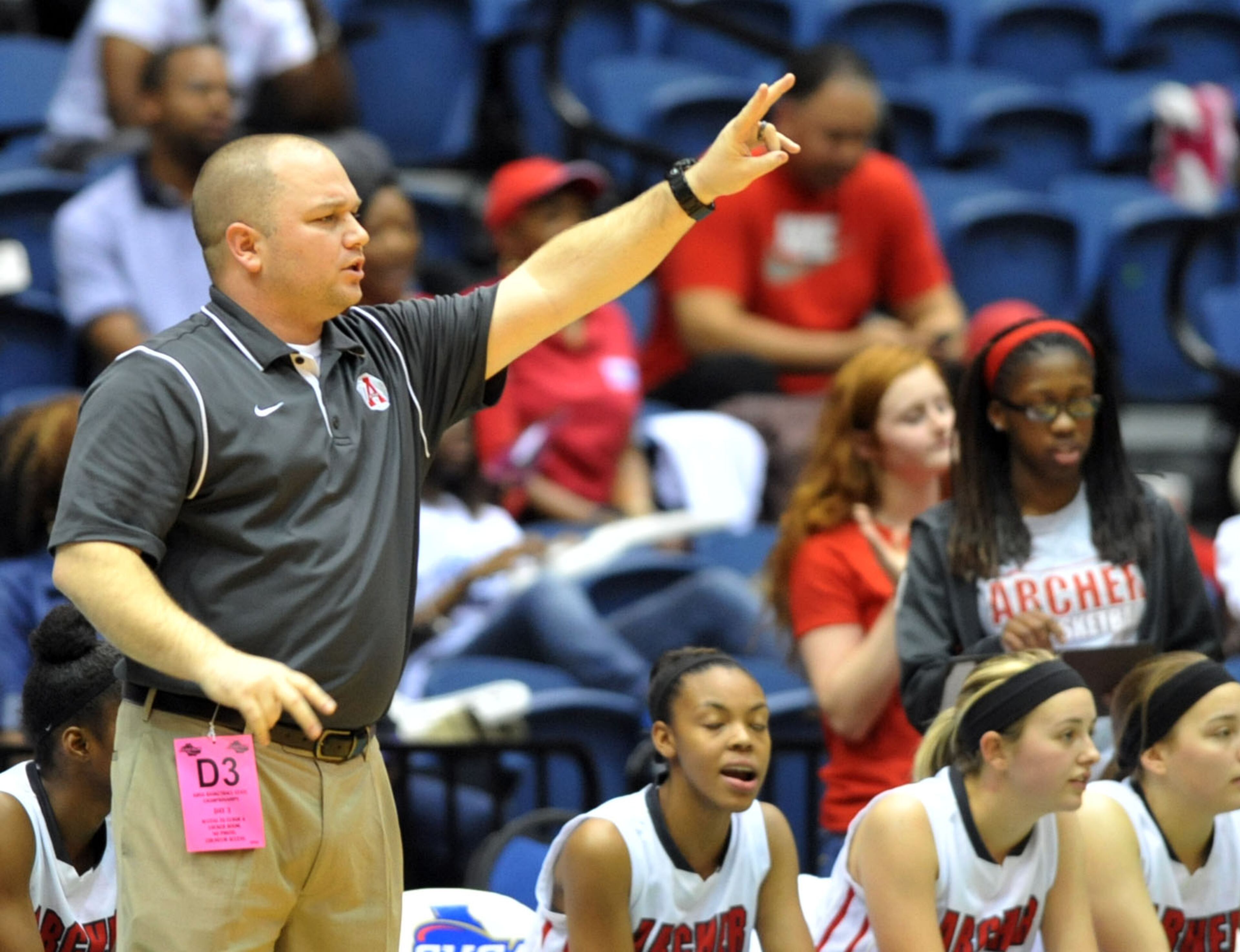 Archer Tigers head coach Ryan Lesniak during action in the first half. Coverage of the Class AAAAAA girls basketball championship between the McEachern Indians and Archer Tigers at the Macon Coliseum Saturday, March 8, 2014. McEachearn led 39-35 at the half.