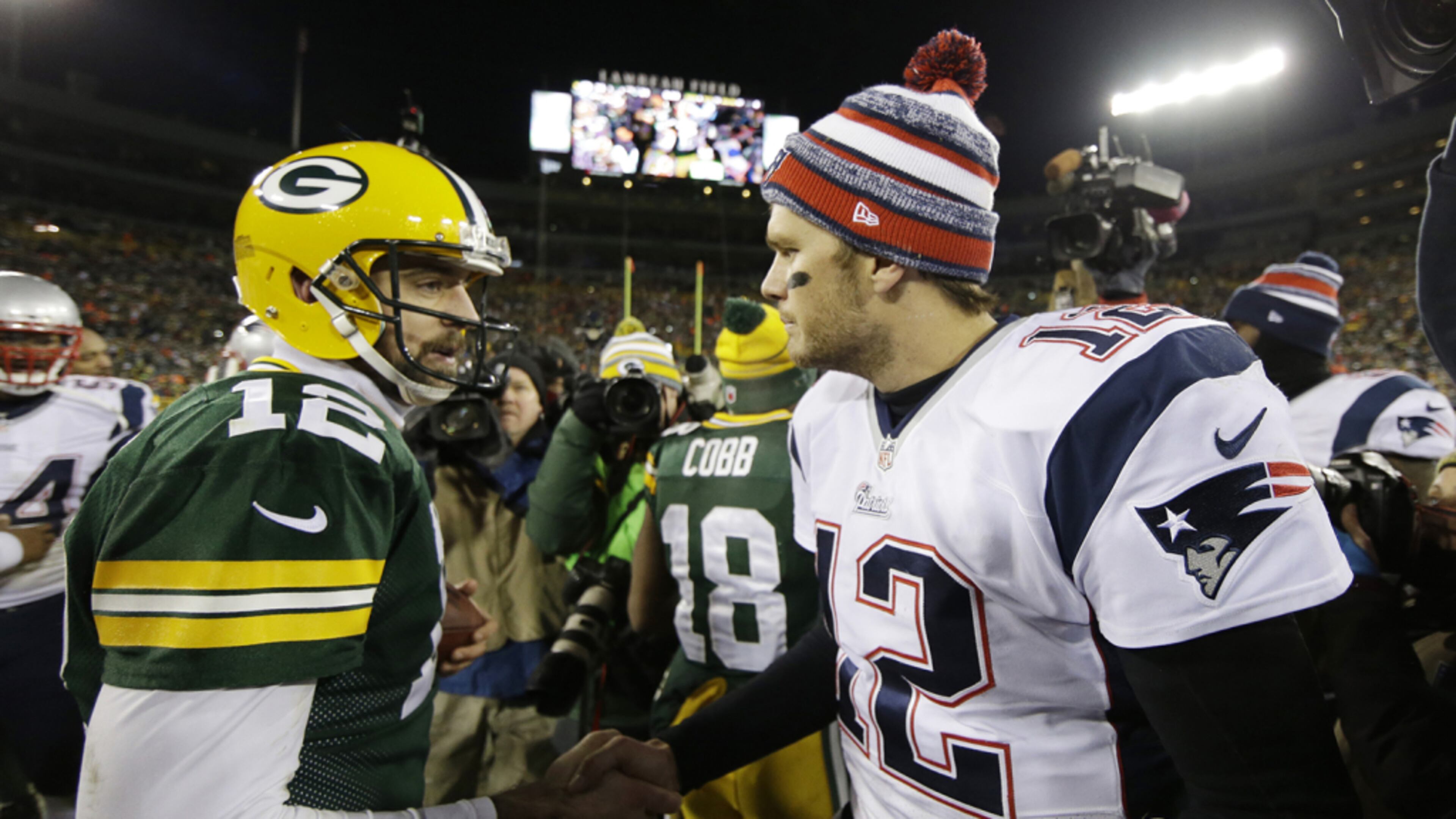 Green Bay Packers' Aaron Rodgers shakes hands with New England Patriots' Tom Brady after an NFL football game Sunday, Nov. 30, 2014, in Green Bay, Wis. The Packers won 26-21. (AP Photo/Tom Lynn) Green Bay Packers' Aaron Rodgers shakes hands with New England Patriots' Tom Brady after an NFL football game Sunday, in Green Bay, Wis. The Packers won 26-21. The Associated Press