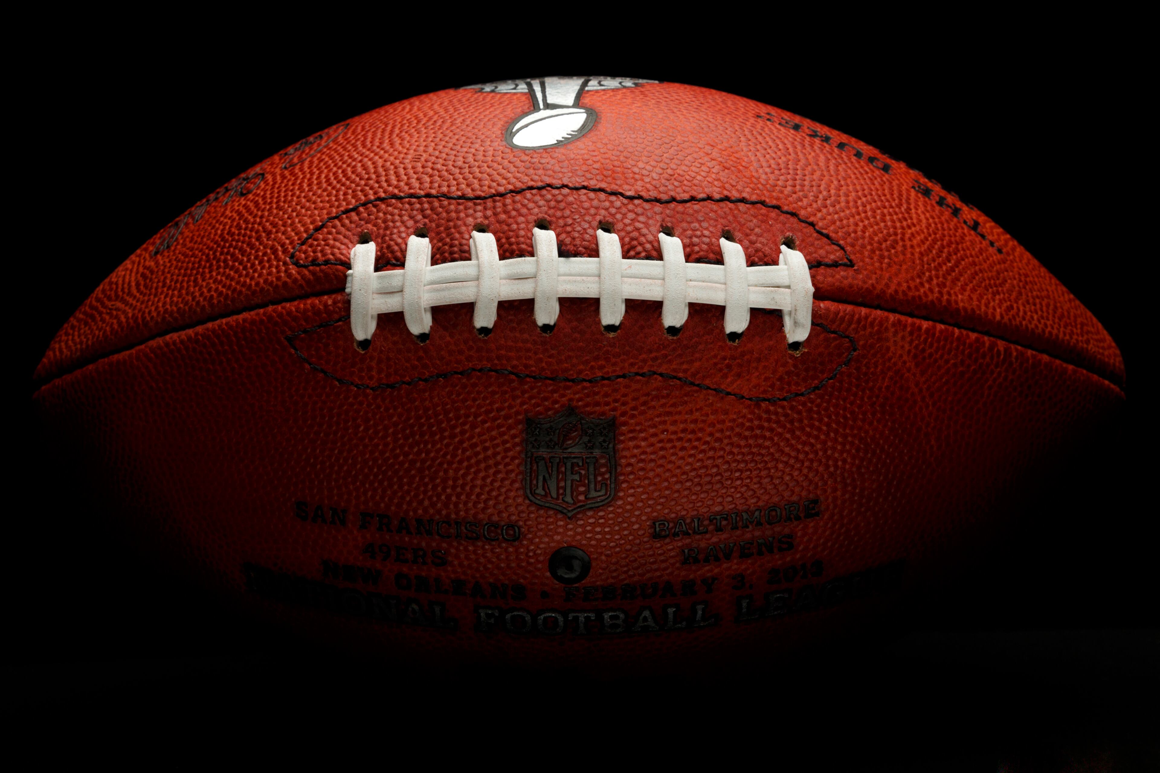 An official game ball for the NFL football Super Bowl XLVII. Tuesday, Jan. 22, 2013. The Wilson Sporting Goods football factory in Ada, Ohio, which has made the official Super Bowl football since the first Super Bowl in 1966, began making the this year's game balls Sunday night immediately after the conclusion of the NFC and AFC championship games.The San Francisco Forty Niners will play the Baltimore Ravens in the Super Bowl on Feb. 3 in New Orleans. (AP Photo/Rick Osentoski)