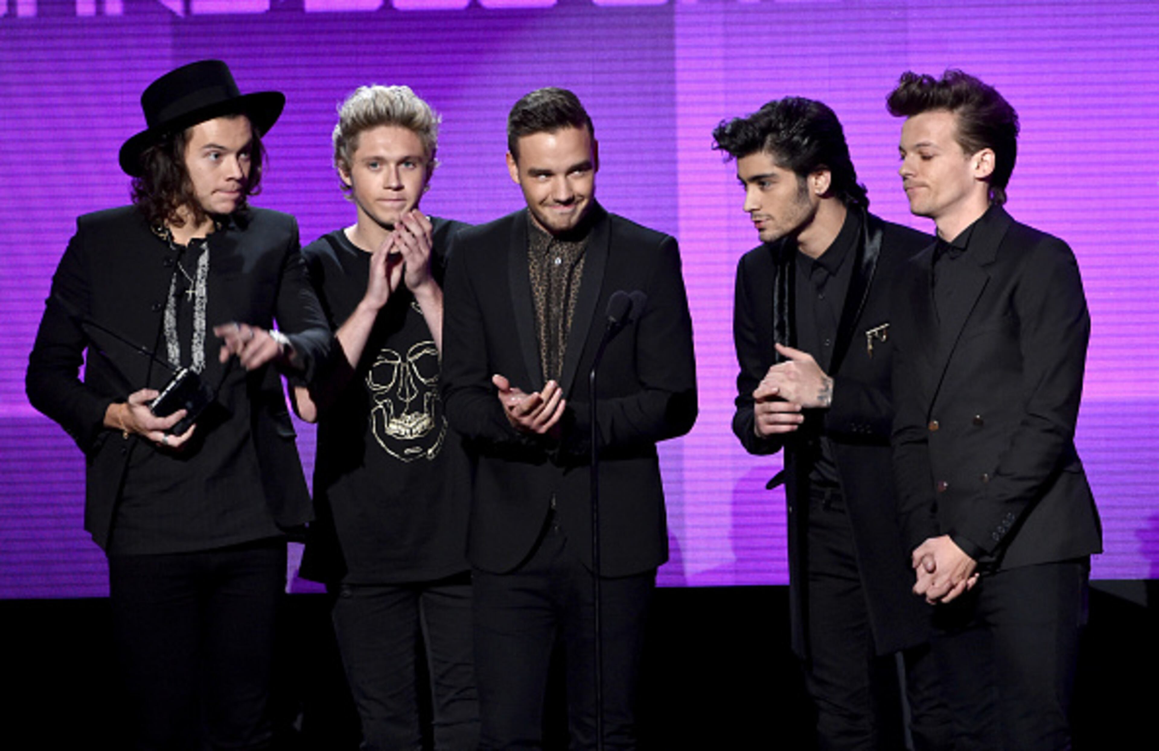 LOS ANGELES, CA - NOVEMBER 23: (L-R) Recording artists Harry Styles, Niall Horan, Liam Payne, Zayn Malik and Louis Tomlinson of One Direction accept the Favorite Pop/Rock Band/Duo/Group award onstage at the 2014 American Music Awards at Nokia Theatre L.A. Live on November 23, 2014 in Los Angeles, California. (Photo by Kevin Winter/Getty Images)