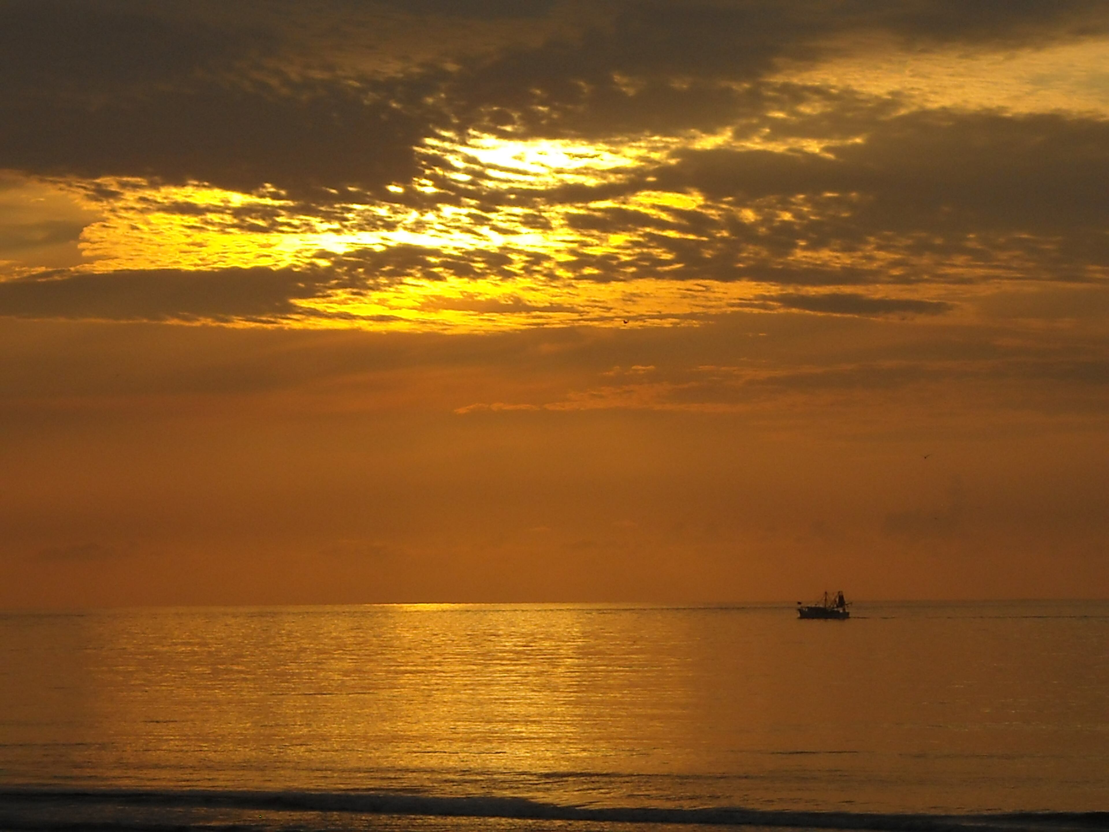 These sunrise photos were taken on Sapelo Island, Ga. in late July of this year. Nannygoat Beach is pictured with the shrimp boat.