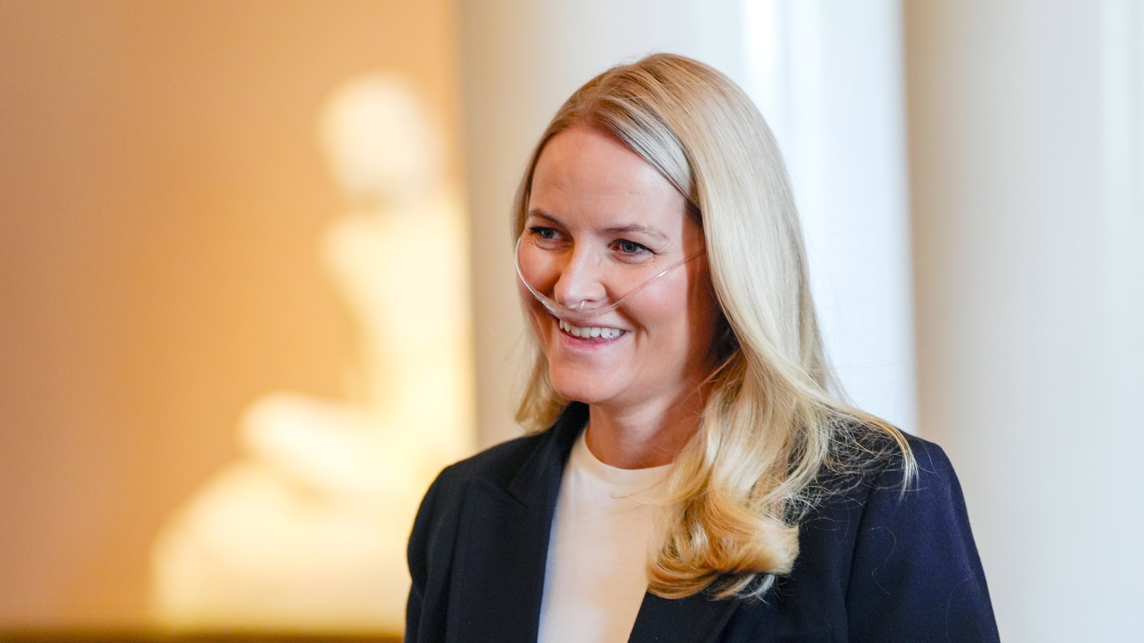 FILE - Norway's Crown Princess Mette Marit smiles during a reception for Norwegian athletes who competed in the Milan Cortina Paralympics, in Oslo, Friday, April 10, 2026. (Lise Åserud/NTB Scanpix via AP, File)