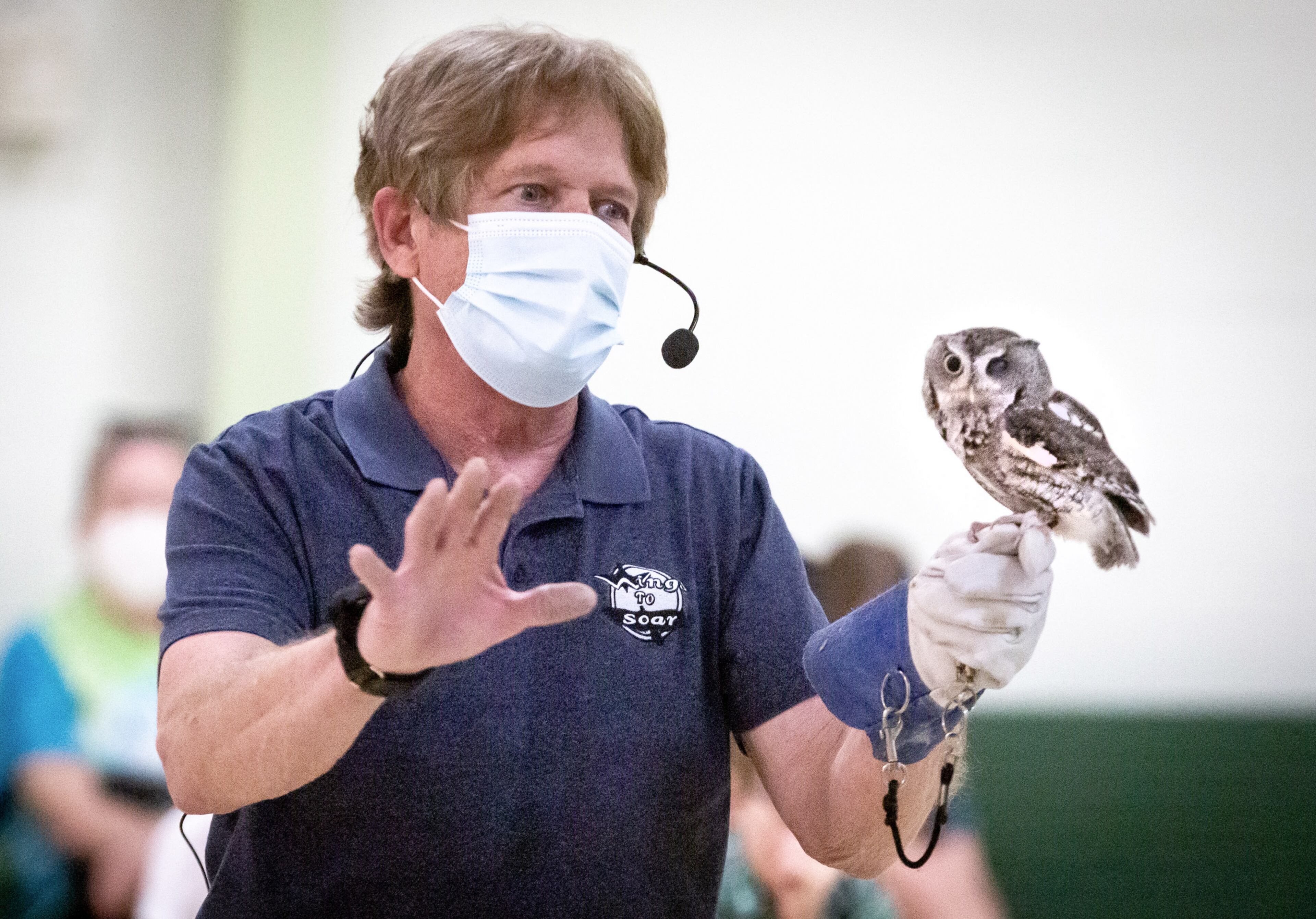 Co-director John Stokes of Wings to Soar, a bird education program, holds a screech owl during a demonstration at the Chattahoochee Nature Center for its Family Fun Day: Flying into the Future on Sunday, March 14, 2021. (Photo: Steve Schaefer for The Atlanta Journal-Constitution)
