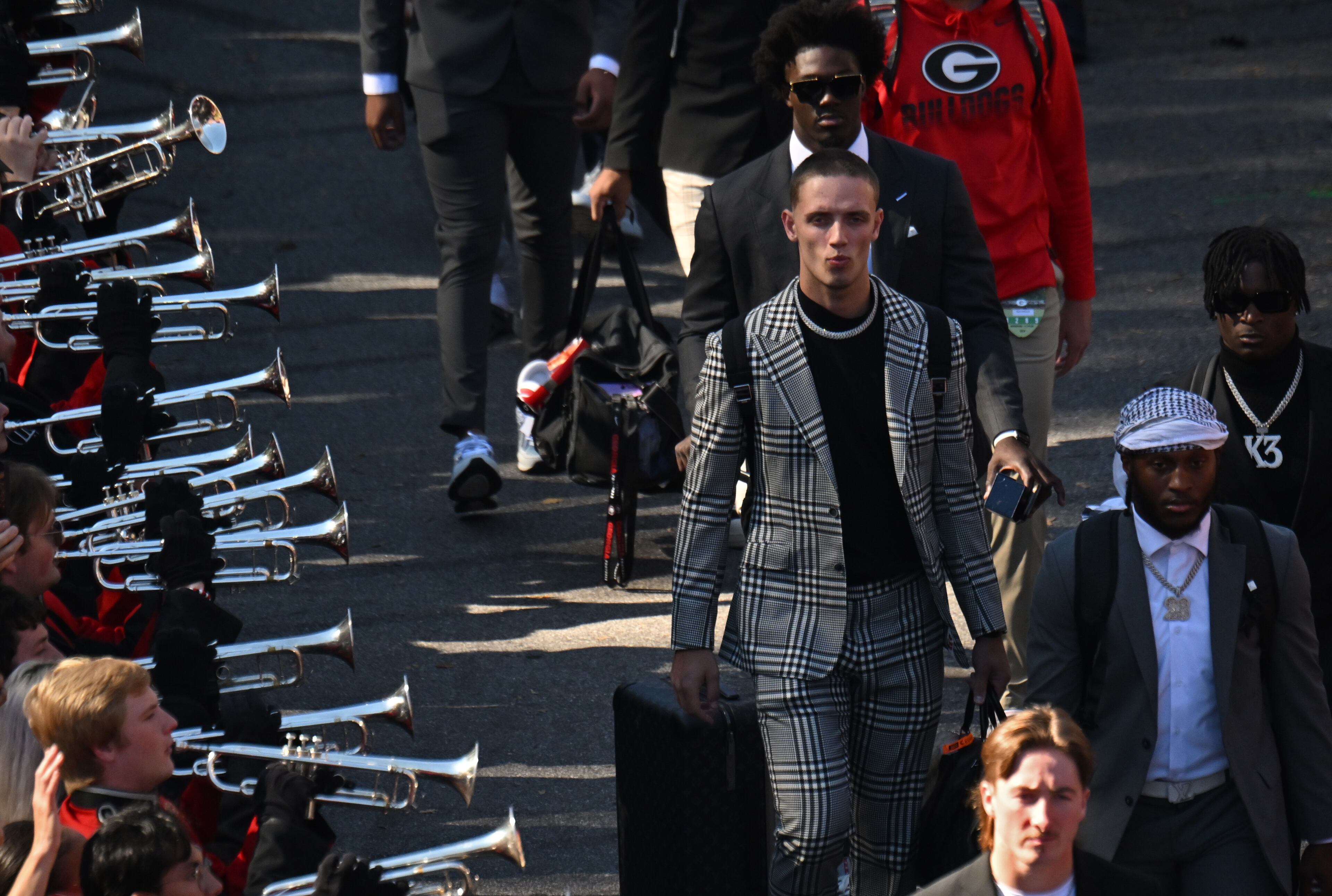 Georgia quarterback Carson Beck (center) and other players participate in the Dawg Walk before an NCAA football game against Missouri at Sanford Stadium, Saturday, November 4, 2023, in Athens. (Hyosub Shin / Hyosub.Shin@ajc.com)