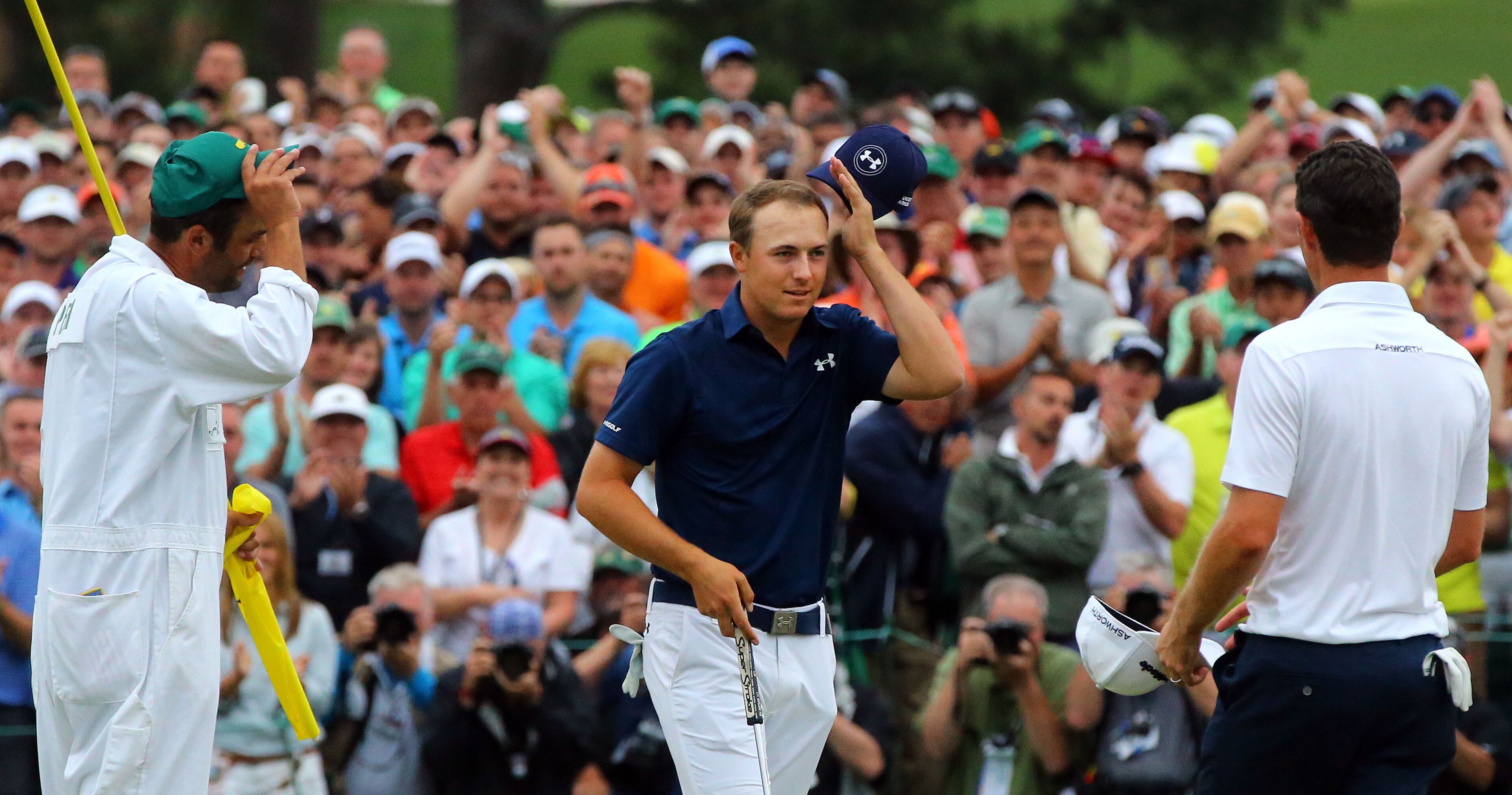 Jordan Spieth reacts on the 18th green as he wins the 79th Masters Golf Tournament at 270, tying Tiger Woods 1997 win. Photos from the final round at the Masters Golf Tournament, Sunday, April 12, 2015. CURTIS COMPTON/CCOMPTON@AJC.COM