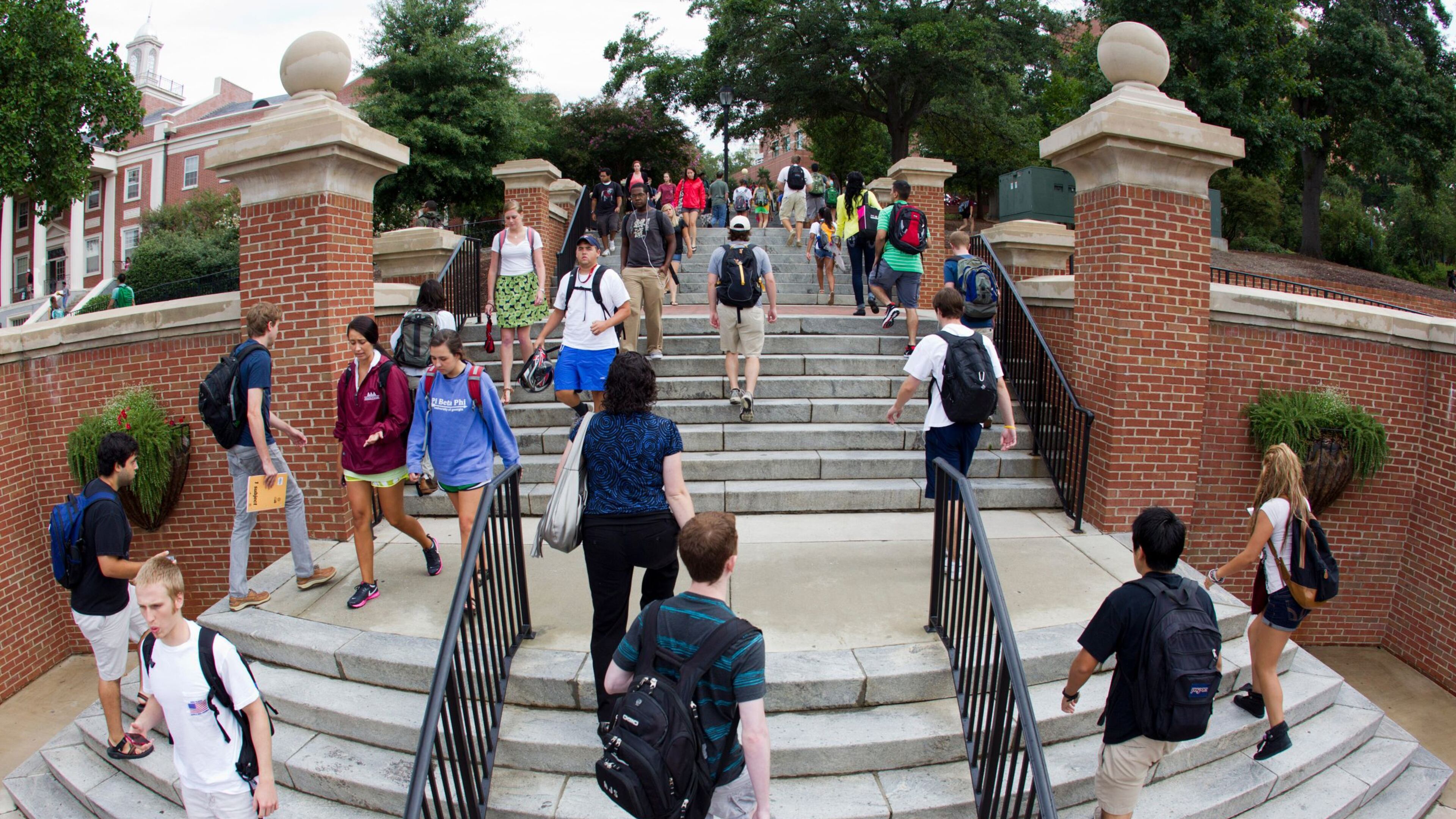 University of Georgia students walk on the Baldwin Street Steps on campus between classes.