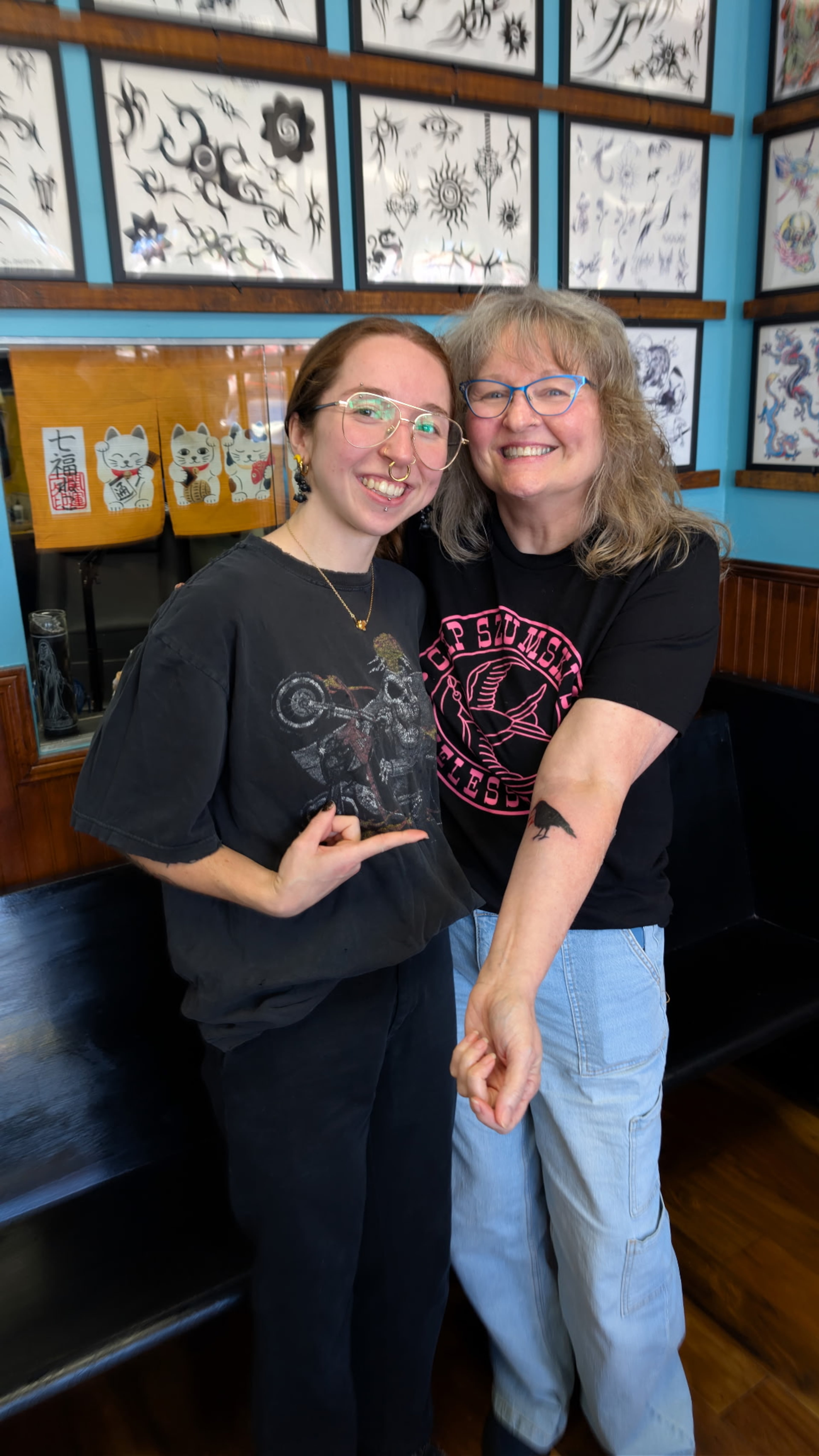 Stephanie Grooms (right) has received multiple tattoos from her daughter, Nova, at Timeless Tattoo. (Courtesy of Stephanie Grooms)