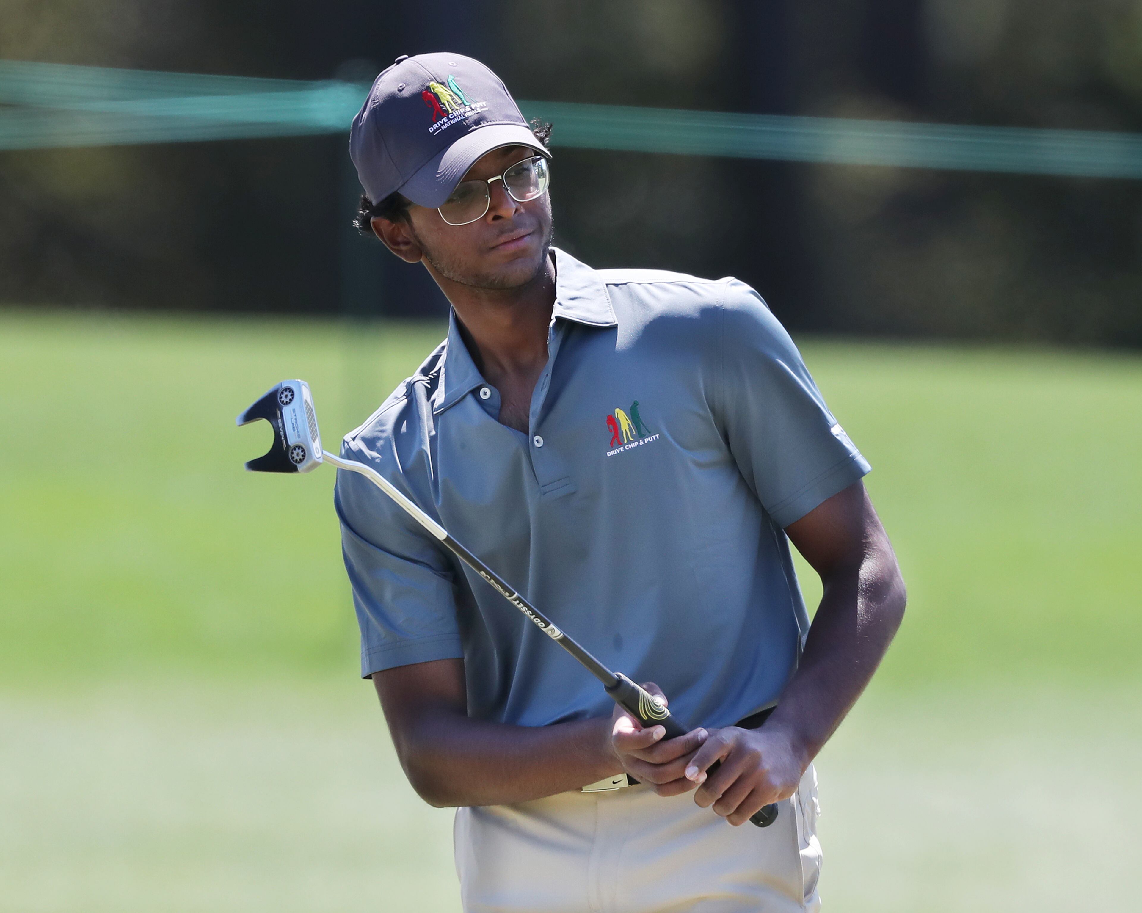Tejas Reddy, Johns Creek, reacts to his putt on the 18th green during the Drive, Chip, and Putt Championship at Augusta National Golf Club on Sunday, April 4, 2021, in Augusta. Curtis Compton / Curtis.Compton@ajc.com