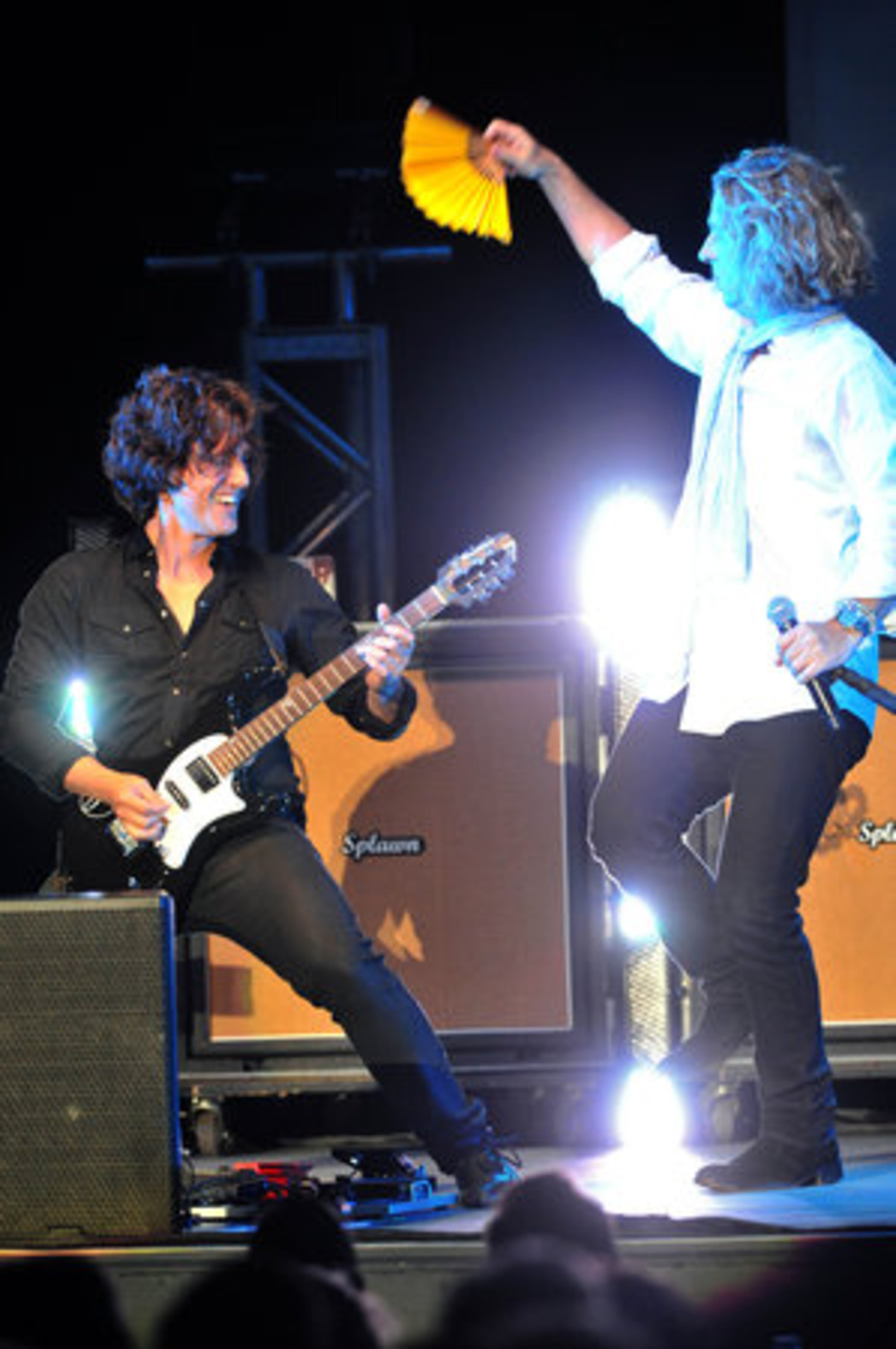 Collective Soul's guitarist Joel Kosche (left) performs as lead singer Ed Roland fans him.