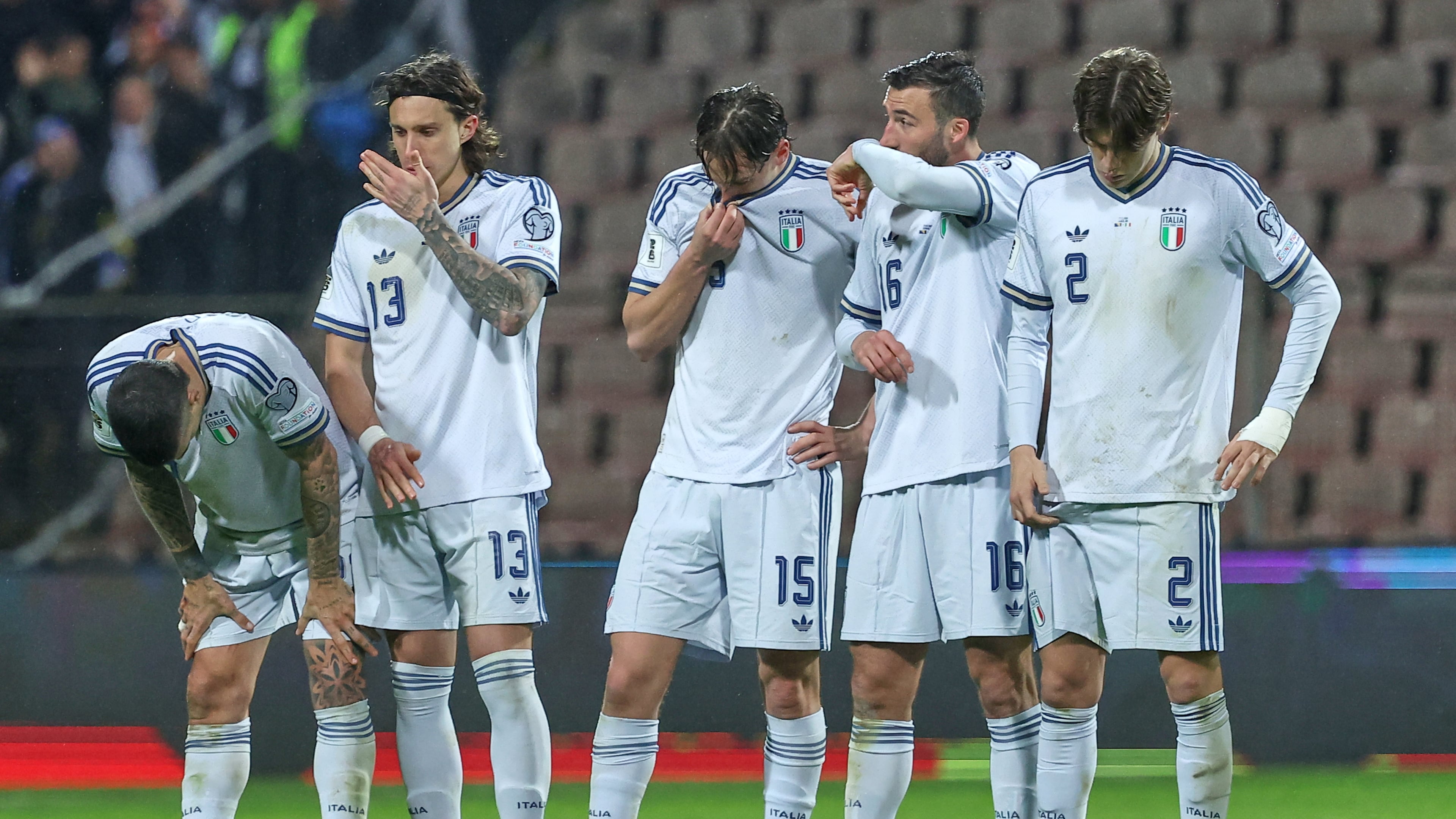 Italy players react during a penalty shootout during the World Cup qualifying playoff final soccer match between Bosnia and Italy in Zenica, Bosnia, Tuesday, March 31, 2026. (AP Photo/Armin Durgut)