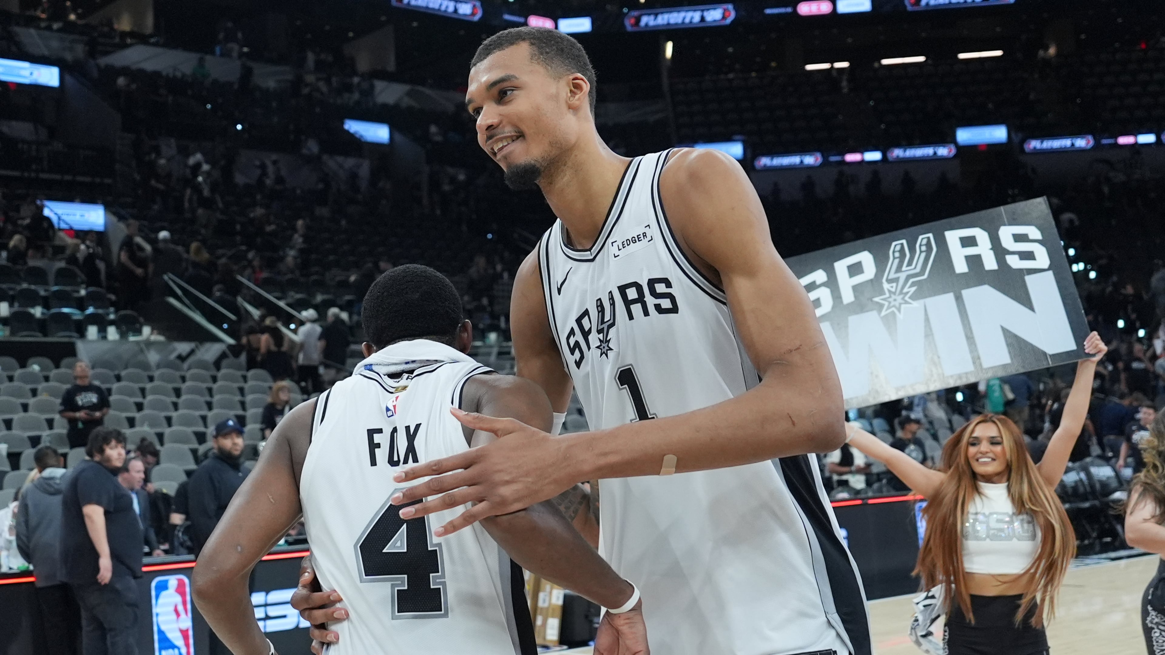 San Antonio Spurs forward/center Victor Wembanyama (1) greets guard De'aaron Fox (4) after Game 5 of a first-round NBA playoffs basketball series against the Portland Trail Blazers in San Antonio, Tuesday, April 28, 2026. (AP Photo/Eric Gay)