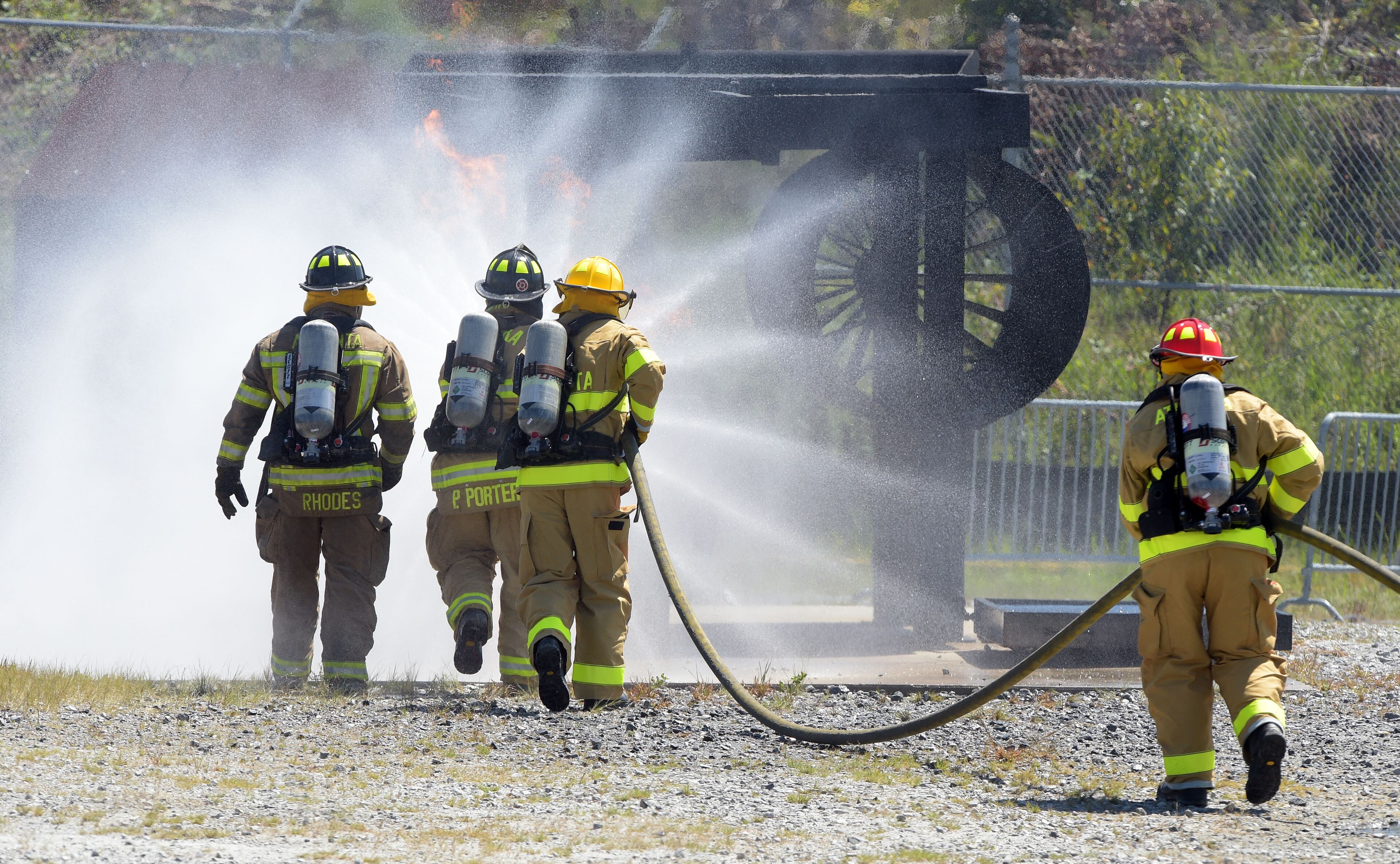 SEPTEMBER 14, 2015 ATLANTA Atlanta Fire Rescue Department firefighters hosted live fire training for attendees at the Aircraft Rescue Fire Fighting (ARFF) Conference, Monday, September, 14, 2015. Firefighters from across the world, battled a simulated fire in an engine and landing gear and also a cascade fire with wing and fuel tanks. Firefighters were Atlanta this week for the 26th Annual ARFF Working Group Conference and Educational Symposium. One of the highlights of the conference was the live fire training at the Hartsfield-Jackson firefighter training site. KENT D. JOHNSON/KDJOHNSON@AJC.COM