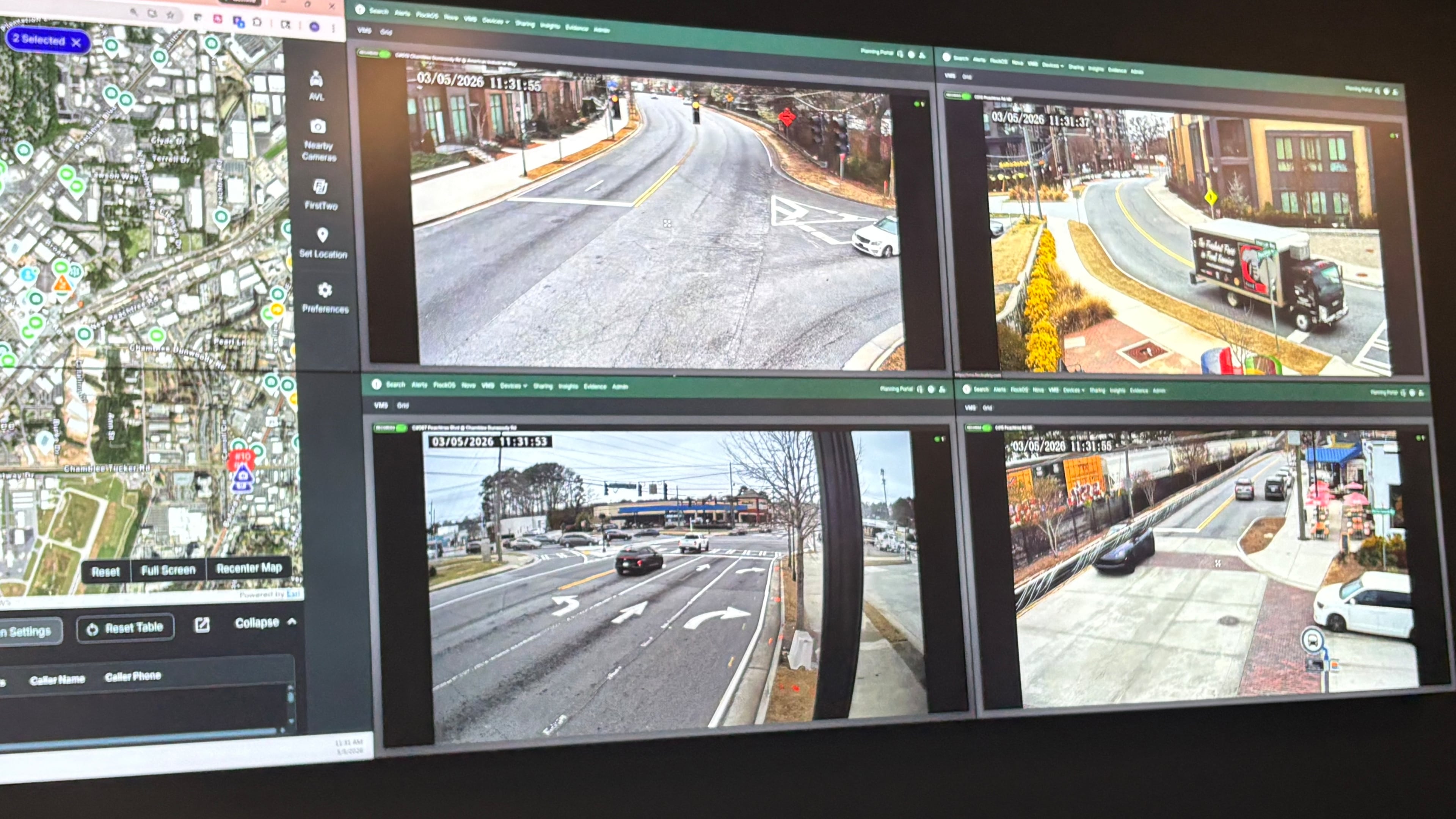 Monitors inside Chamblee's Real Time Crime Center show live camera feeds from parks and intersections across the city. (Shaddi Abusaid/AJC)