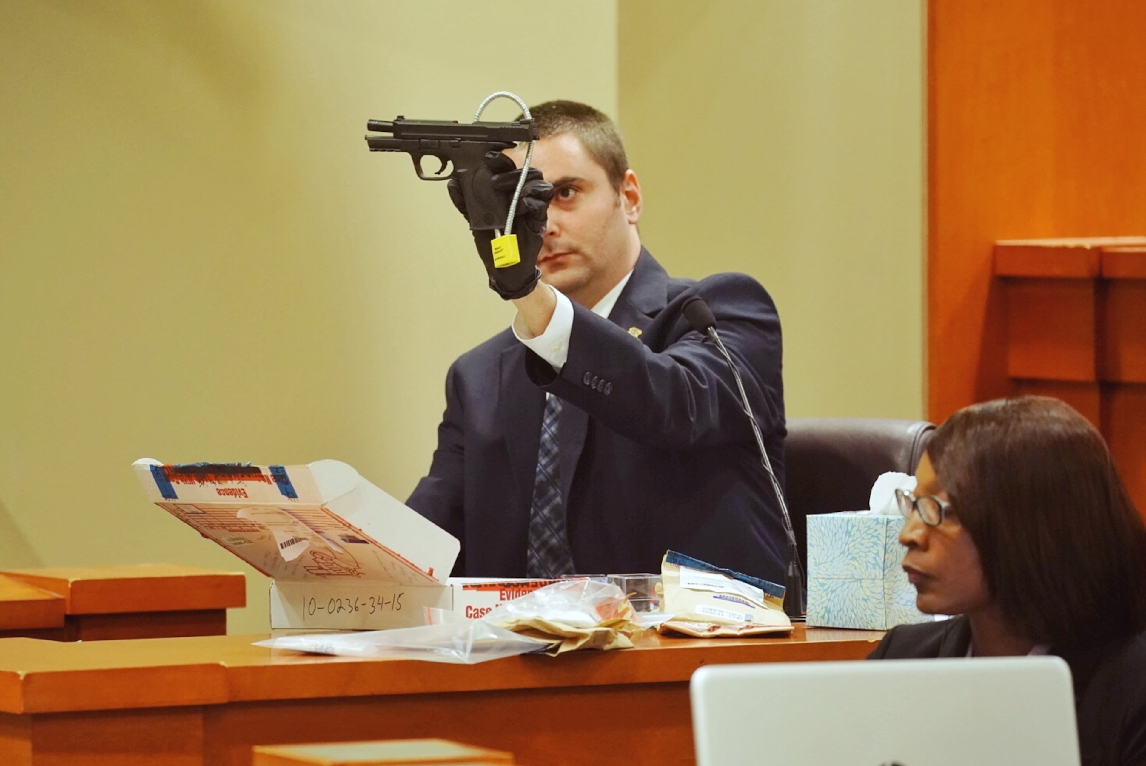 Crime scene specialist Joshua Ellis testifies during day three of the Robert Olson murder trial at the DeKalb County Courthouse on October 1, 2019 in Decatur. Olsen is charged with murdering war veteran Anthony Hill. (Elijah Nouvelage for The Atlanta Journal Constitution)