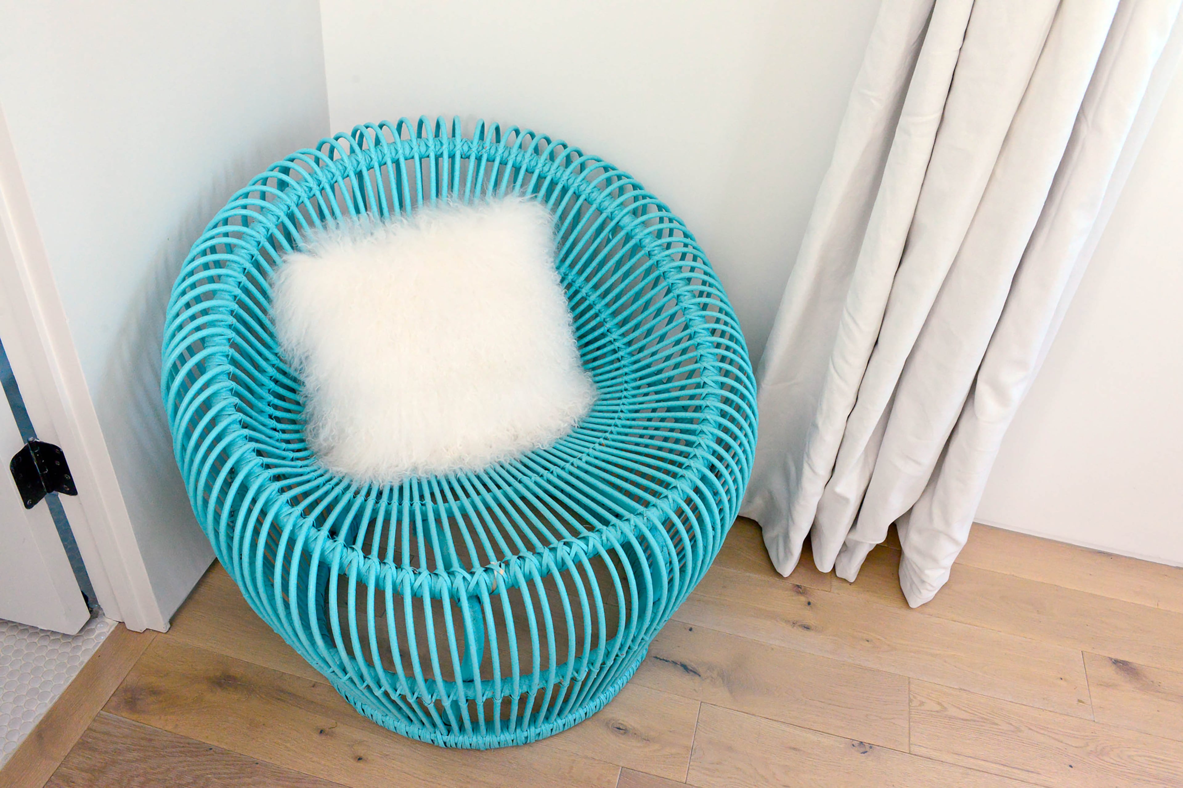 Caroline Normark gave her children free rein to design their bedrooms. Millie shows off her favorite color, turquoise, in the accent chair she chose for one corner of her room. Christopher Oquendo/AJC FILE