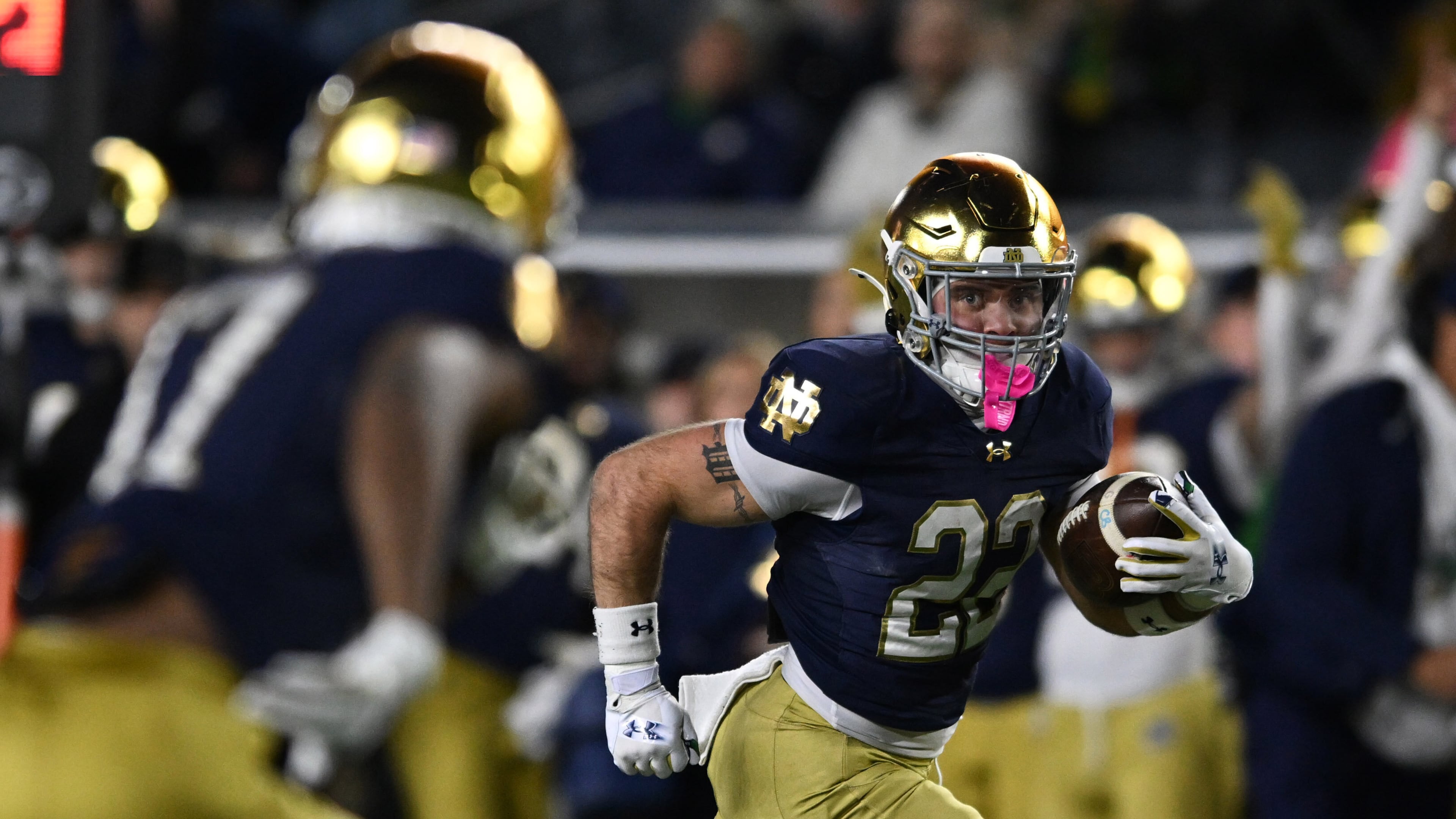 FILE - Notre Dame running back Aneyas Williams (22) rushes for a touchdown during the fourth quarter of an NCAA football game against Syracuse, Nov. 22, 2025, in South Bend, Ind. (AP Photo/Paul Beaty, File)