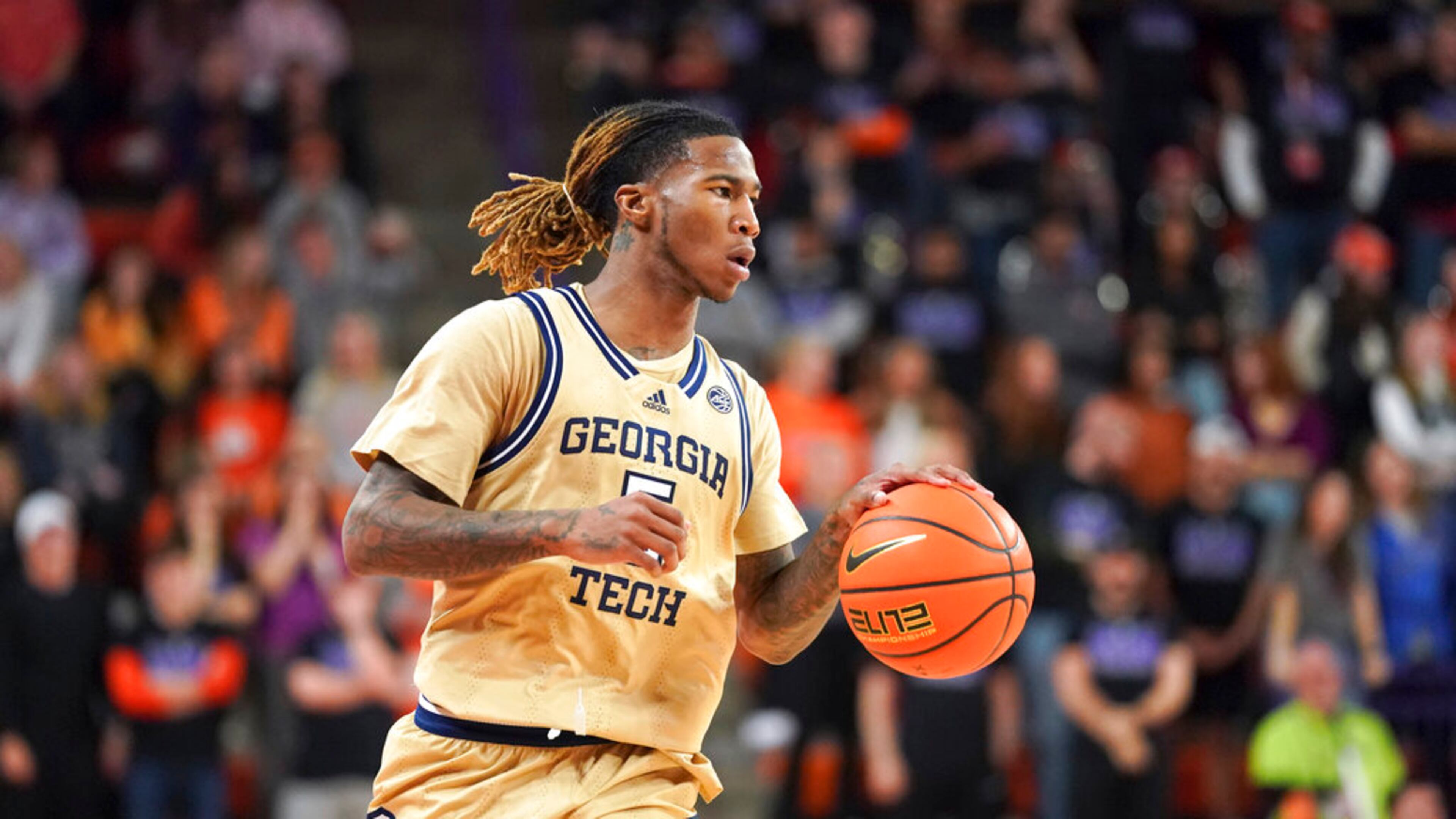 Georgia Tech guard Deivon Smith dribbles the ball during the first half of an NCAA college basketball game against Clemson Tuesday, Jan. 24, 2023, in Clemson, S.C. (AP Photo/Sean Rayford)
