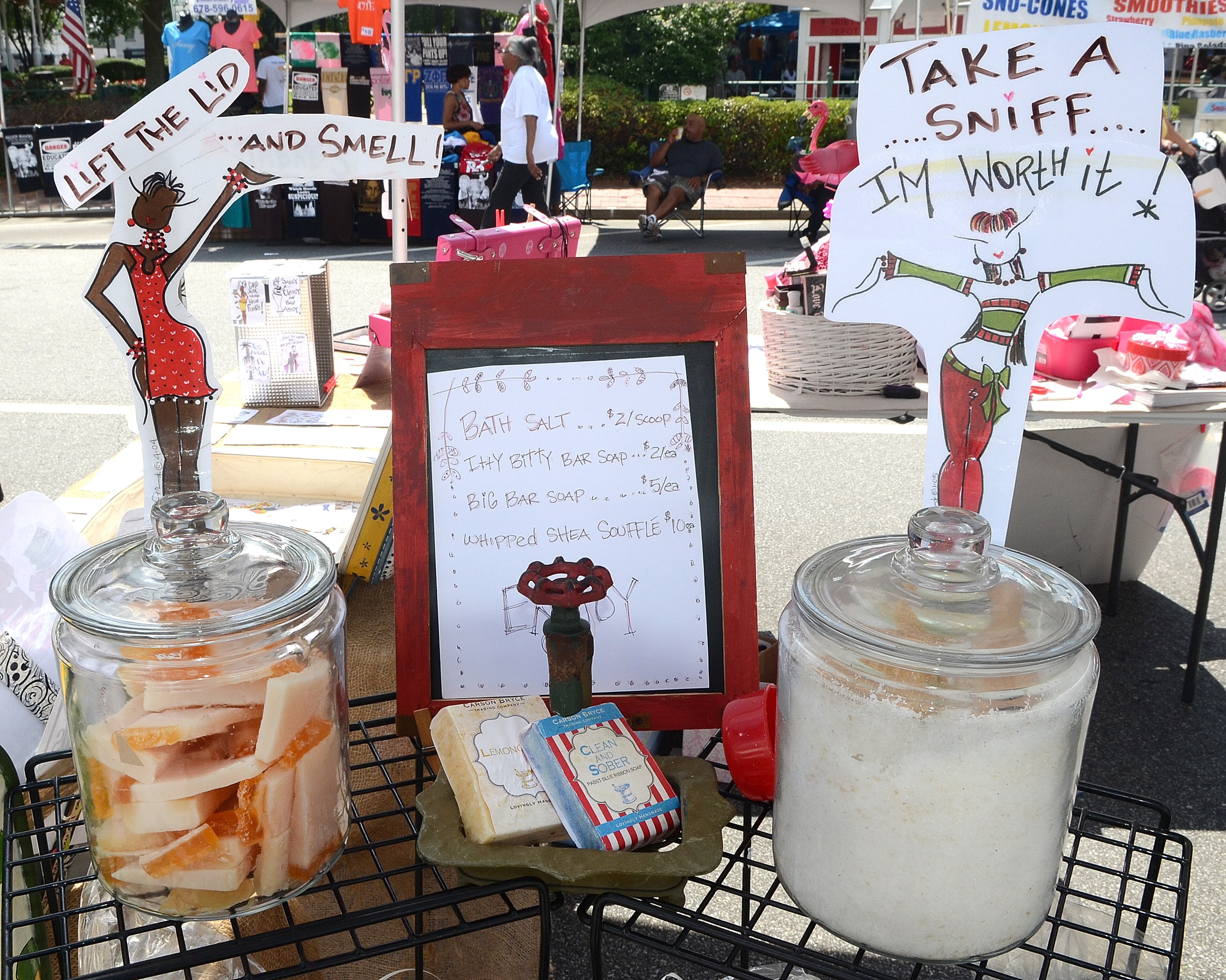 Handmade and "Made with love" soaps and bath products are a few of the unique items for people to purchase at the 11th Annual Juneteenth Cultural Festival. (PHOTO M. CHRIS HUNT)