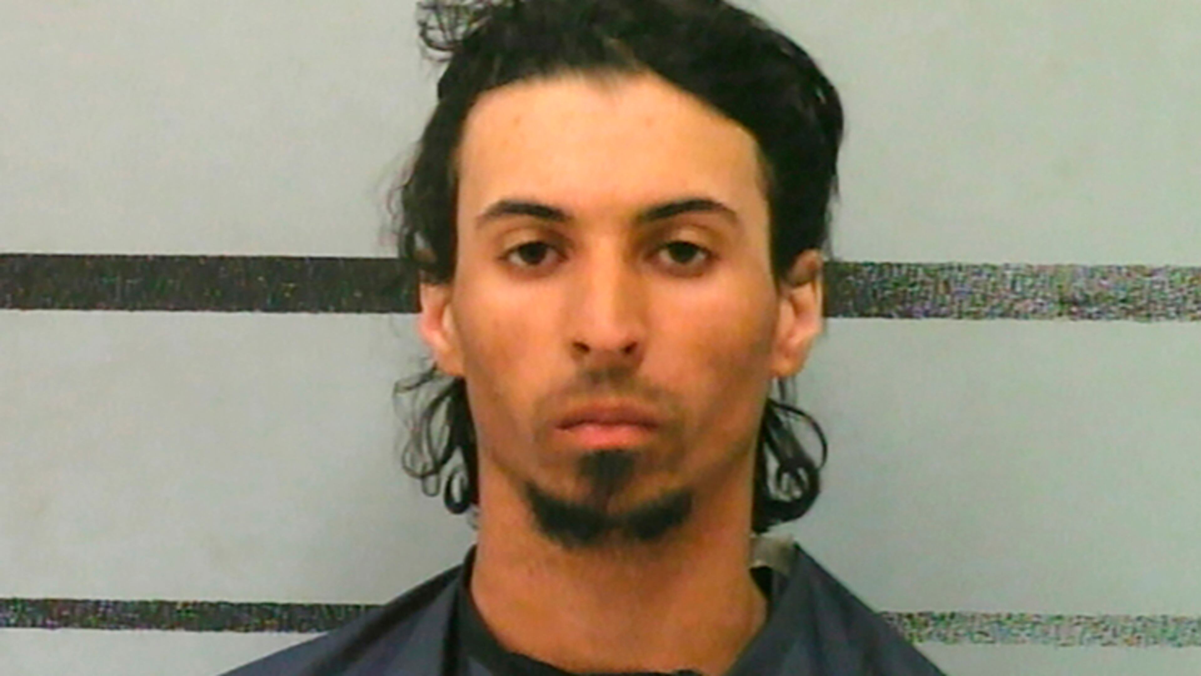 Trevor Marquis Rowe is accused of stuffing his girlfriend's 10-month-old daughter into a backpack and leaving her in a car trunk for five hours. He was charged Wednesday with capital murder.