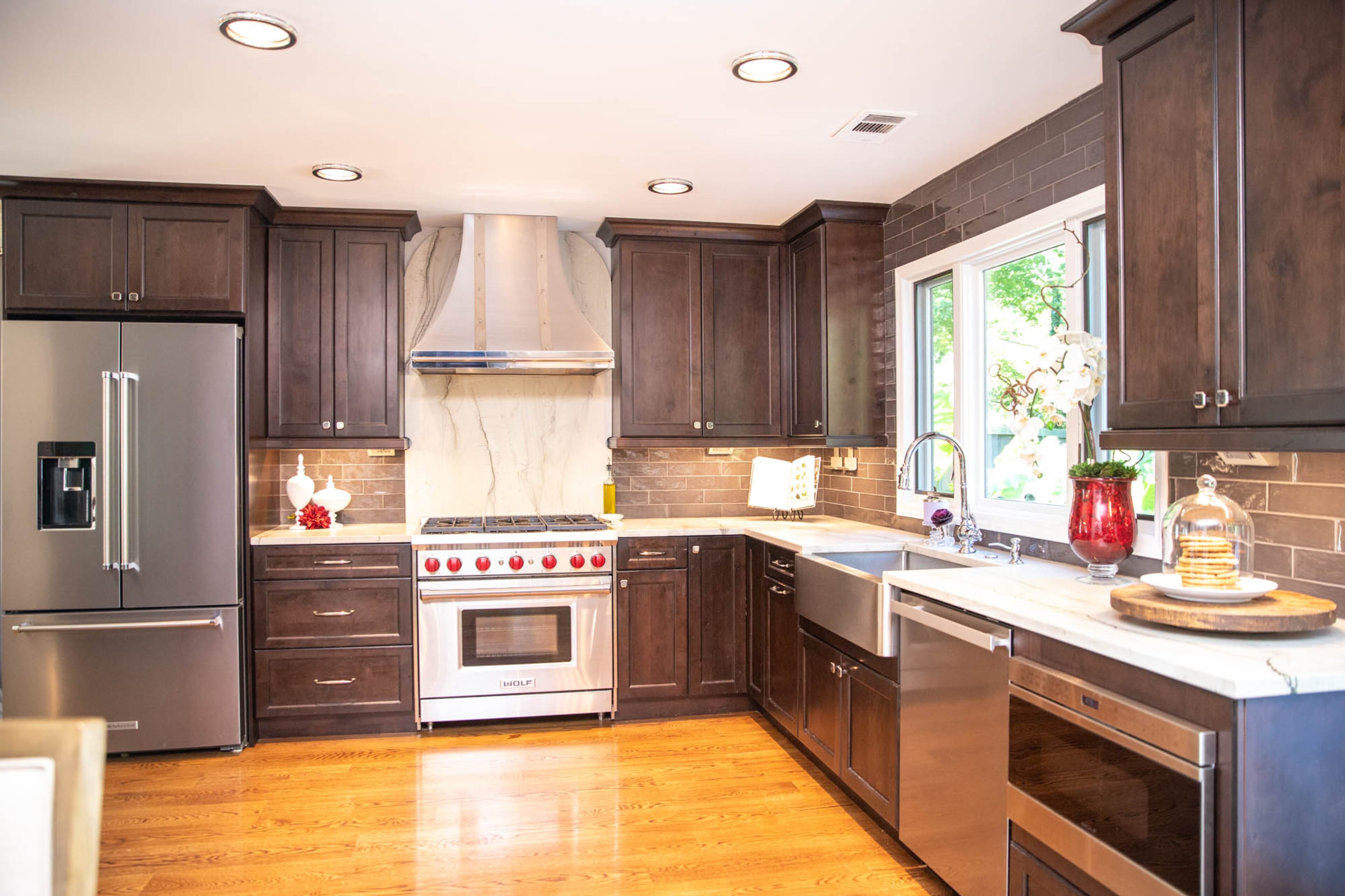 Kenneth and Liza Hare remodeled their kitchen in 2018, replacing the counters with leathered quartzite from Miami Circle Marble & Fabrication and adding a subway tile backsplash. Liza decided against an island, opting instead for a wide open space with clean lines. The new cabinets are from Founders Kitchen & Bath. Text by Shannon Dominy/Photo by Reynolds Rogers