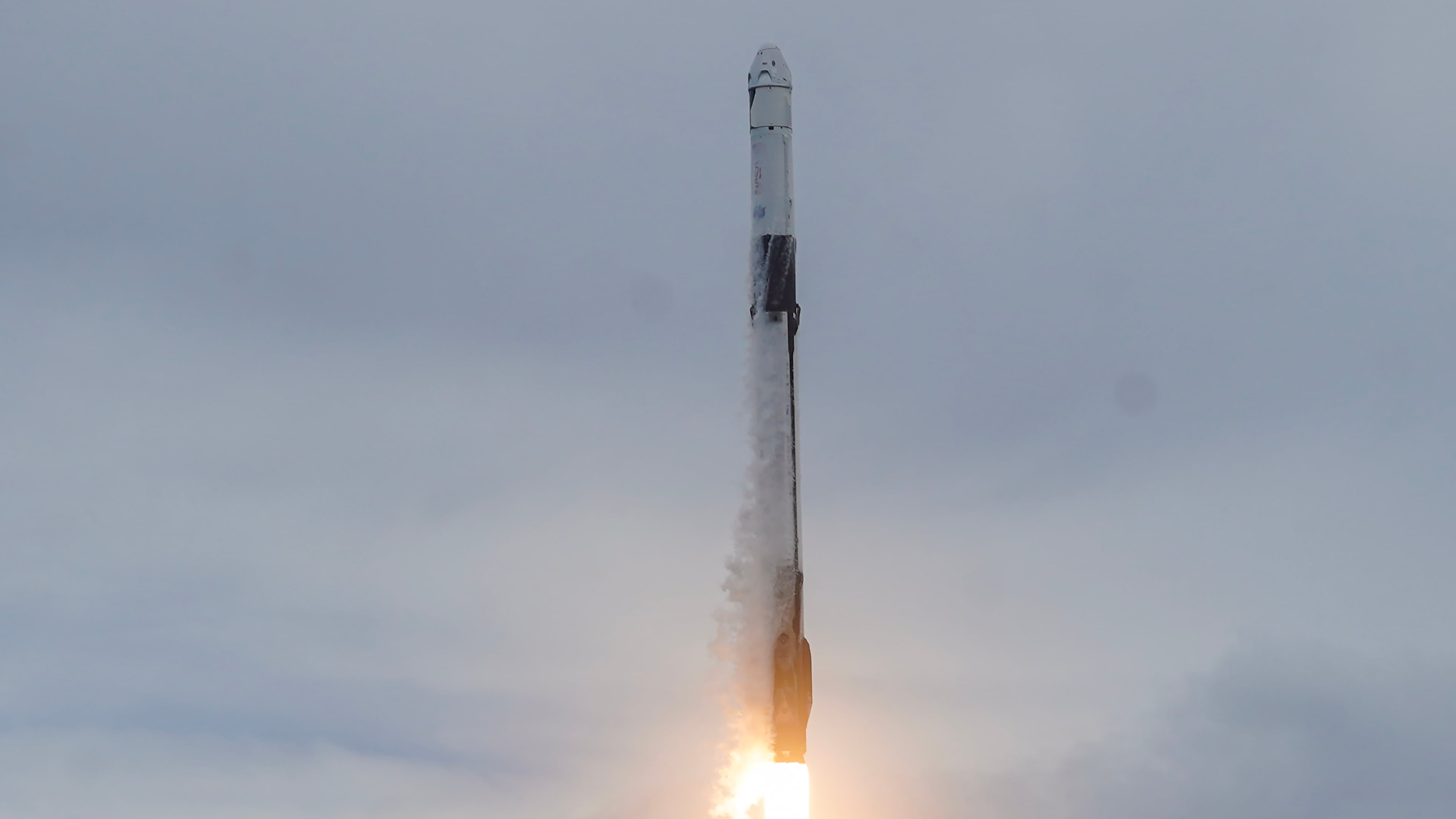A SpaceX Falcon 9 rocket with a crew of four launches from pad 40 at the Cape Canaveral Space Force Station in Cape Canaveral, Fla., Thursday, Oct. 1, 2026. (AP Photo/John Raoux)