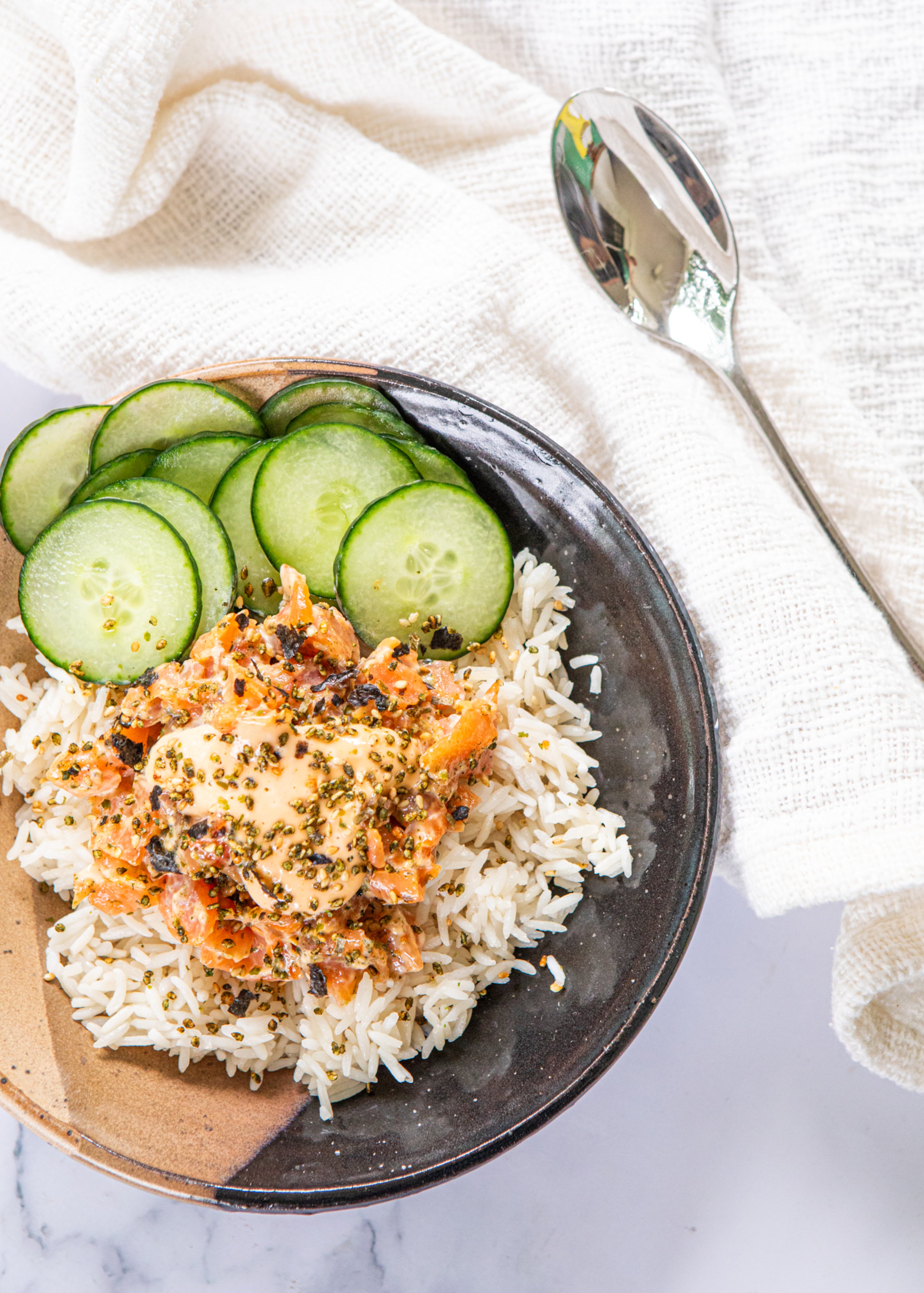 For these Easy Salmon Poke Bowls, grab a pack of cold-smoked salmon for a texture similar to raw fish but without the stress. (Aaliyah Man for the AJC/food styling by Kate Williams)