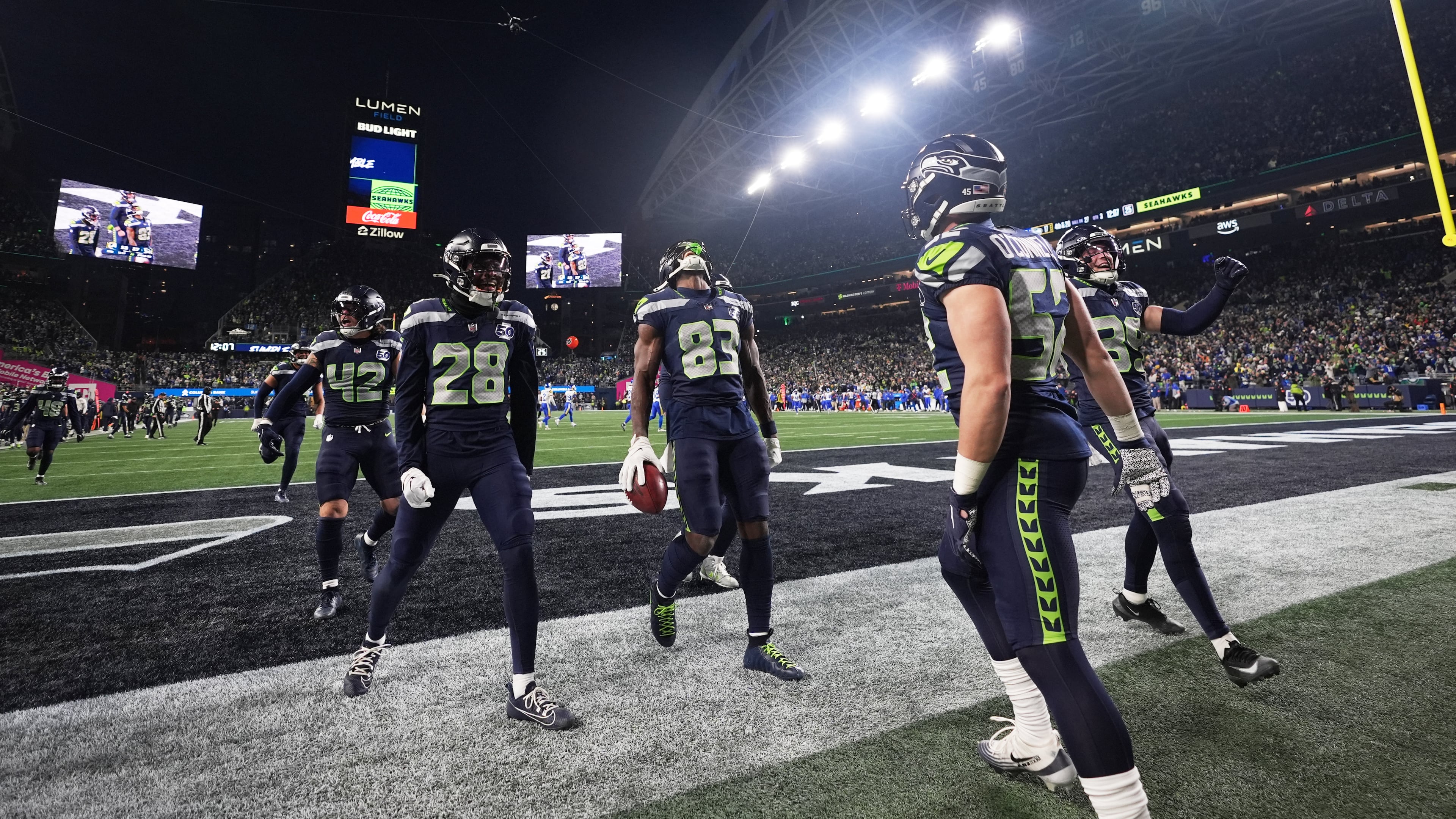 Seattle Seahawks' Dareke Young (83) celebrates after recovering a fumble by Los Angeles Rams wide receiver Xavier Smith during a punt return during the second half of the NFC Championship NFL football game Sunday, Jan. 25, 2026, in Seattle. (AP Photo/Lindsey Wasson)
