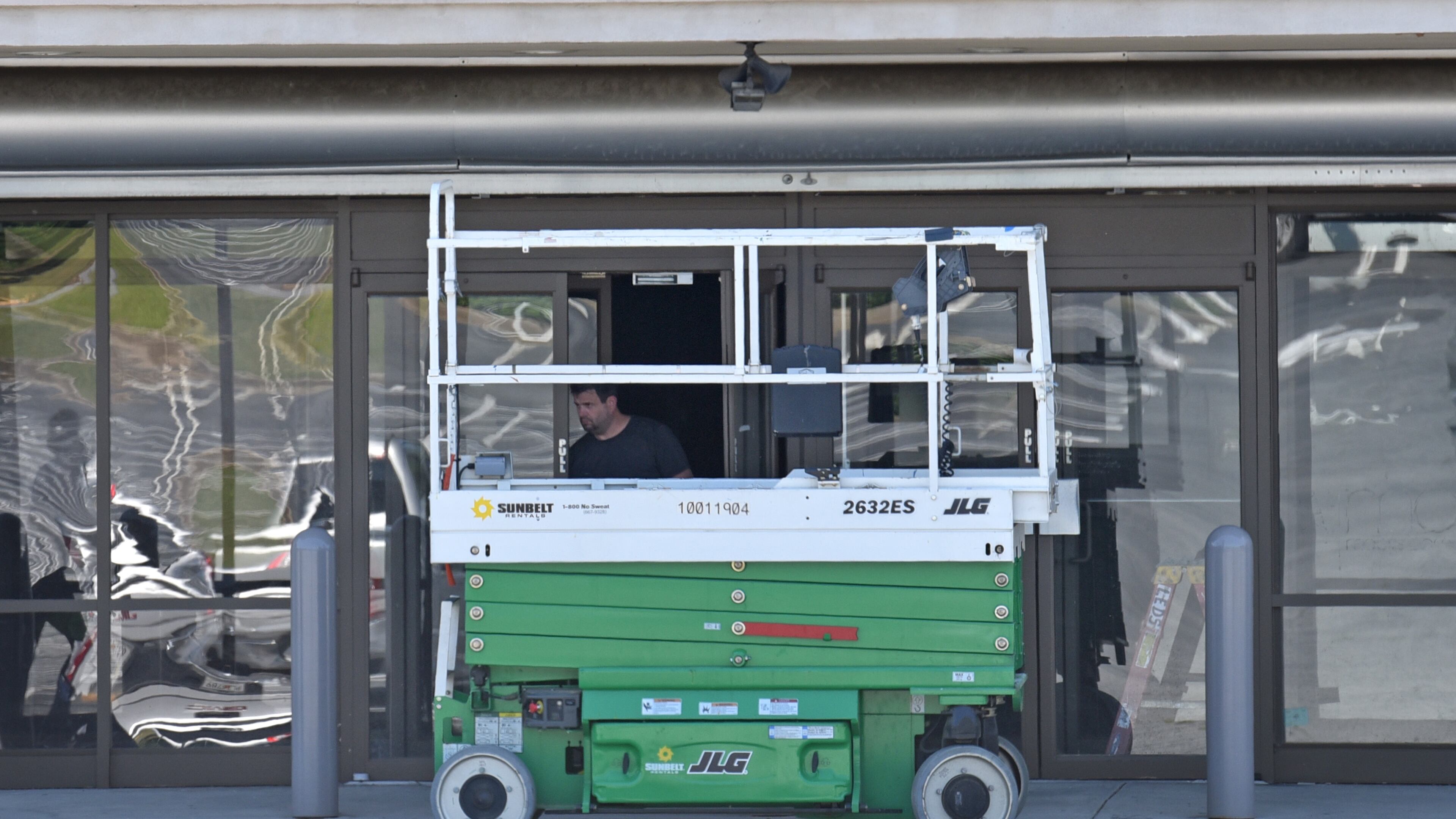 May 2, 2019 Decatur - A crew works on obvious movie set at an empty mall at North DeKalb Mall in Decatur on Thursday, May 2, 2019. North DeKalb is getting a new life as a site for film productions, turning vacant storefronts into fictional sets. HYOSUB SHIN / HSHIN@AJC.COM