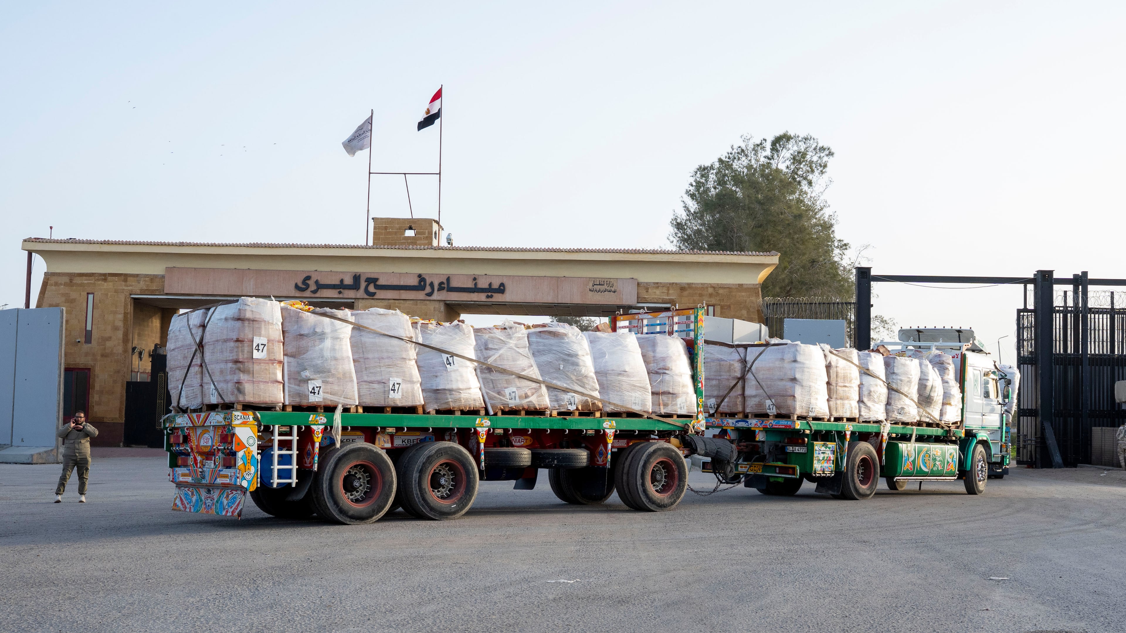 A truck enters the Egyptian gate of the Rafah crossing, heading for inspection by Israeli authorities before entering the Gaza Strip, Tuesday, Jan. 27, 2026. (AP Photo/Mohamed Arafat)