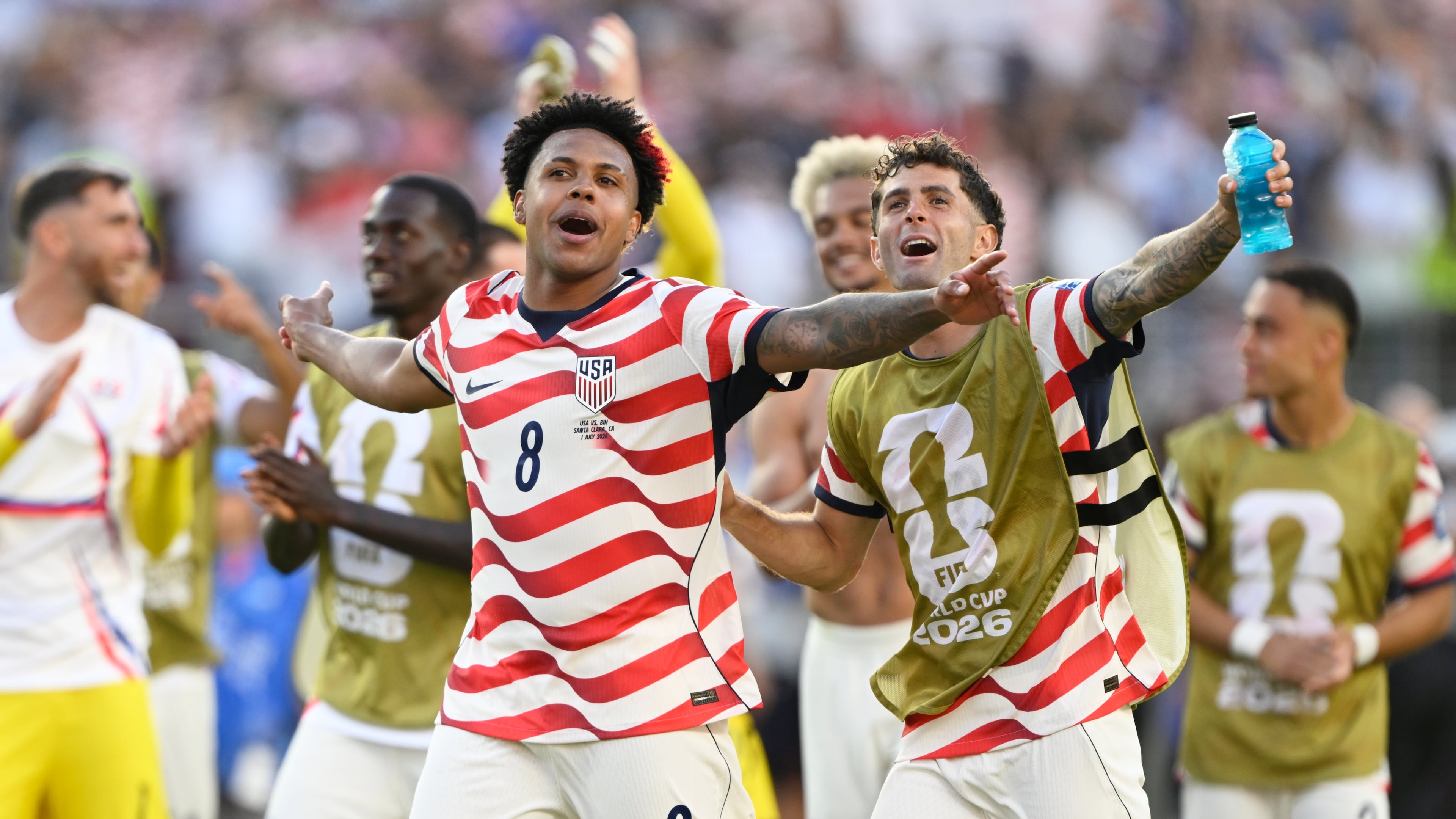 United States' Weston McKennie (8) and Christian Pulisic (10) celebrate winning the World Cup round of 32 soccer match between the United States and Bosnia in Santa Clara, Calif., near San Francisco, Wednesday, July 1, 2026. (AP Photo/Eakin Howard)