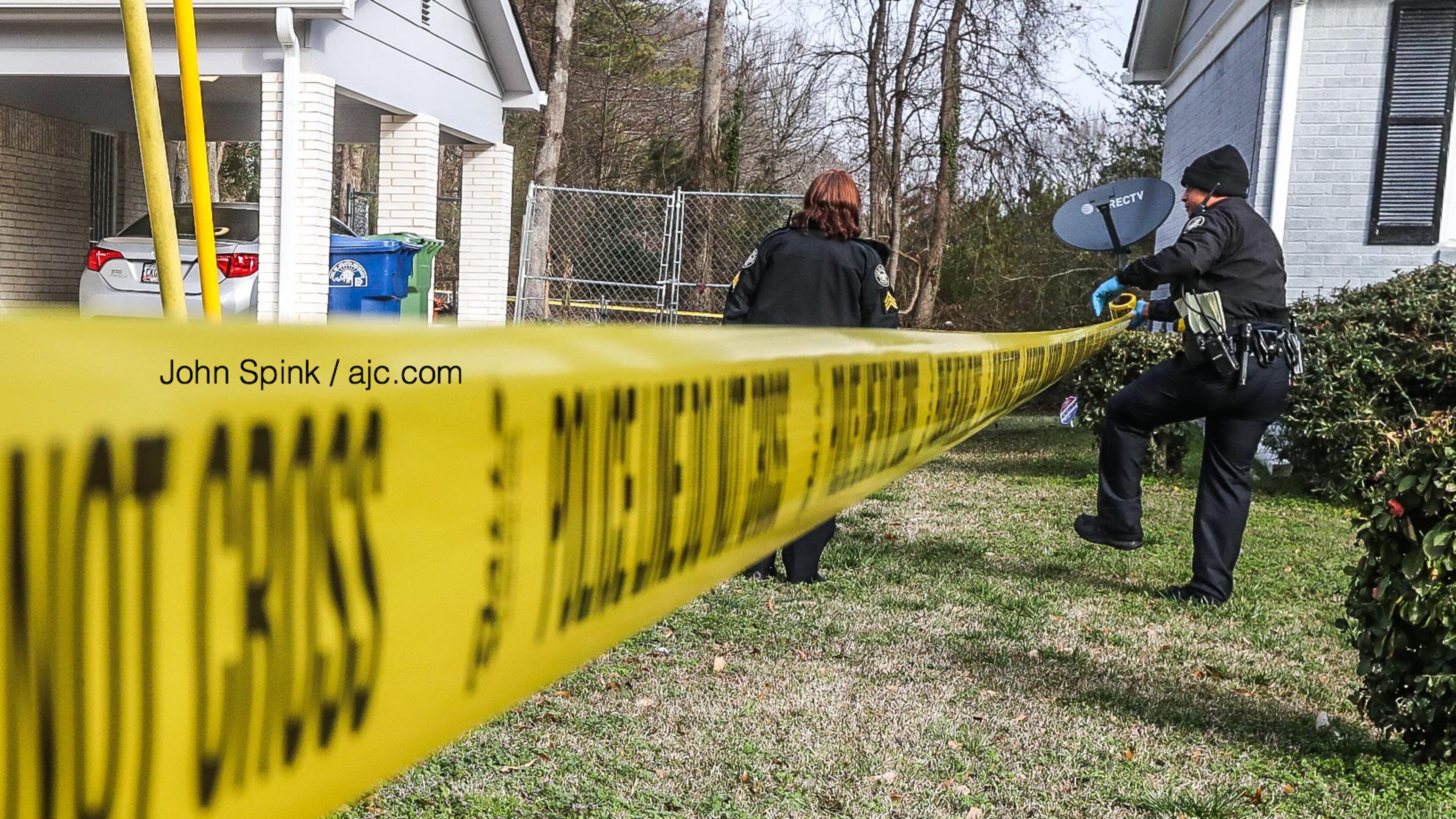 The man's body was found underneath a fence outside the home.