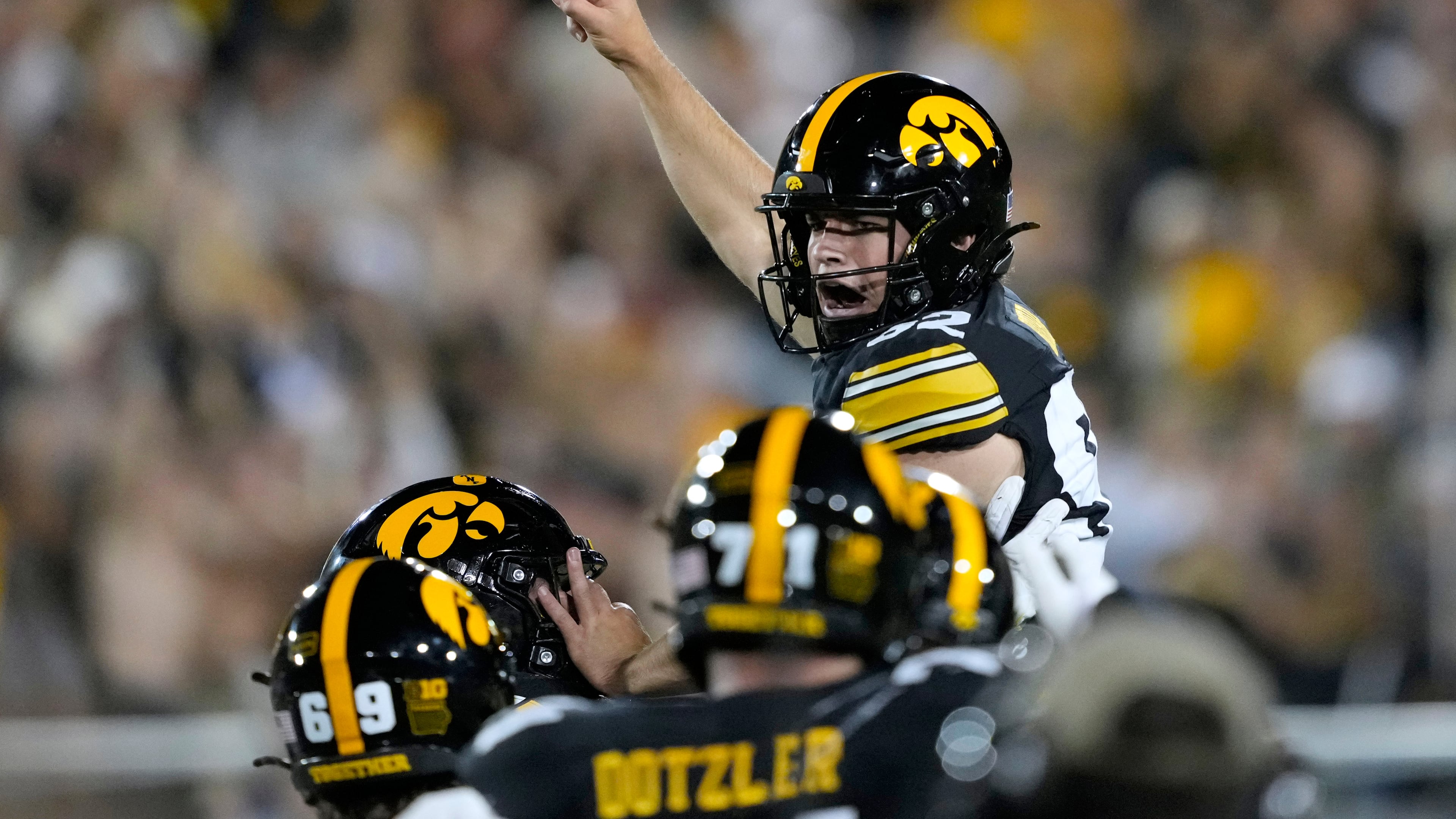 Iowa place kicker Caden Buhr celebrates with teammates after kicking a field goal during the second half of an NCAA college football game against Iowa State, Saturday, Sept. 12, 2026, in Iowa City, Iowa. (AP Photo/Charlie Neibergall)