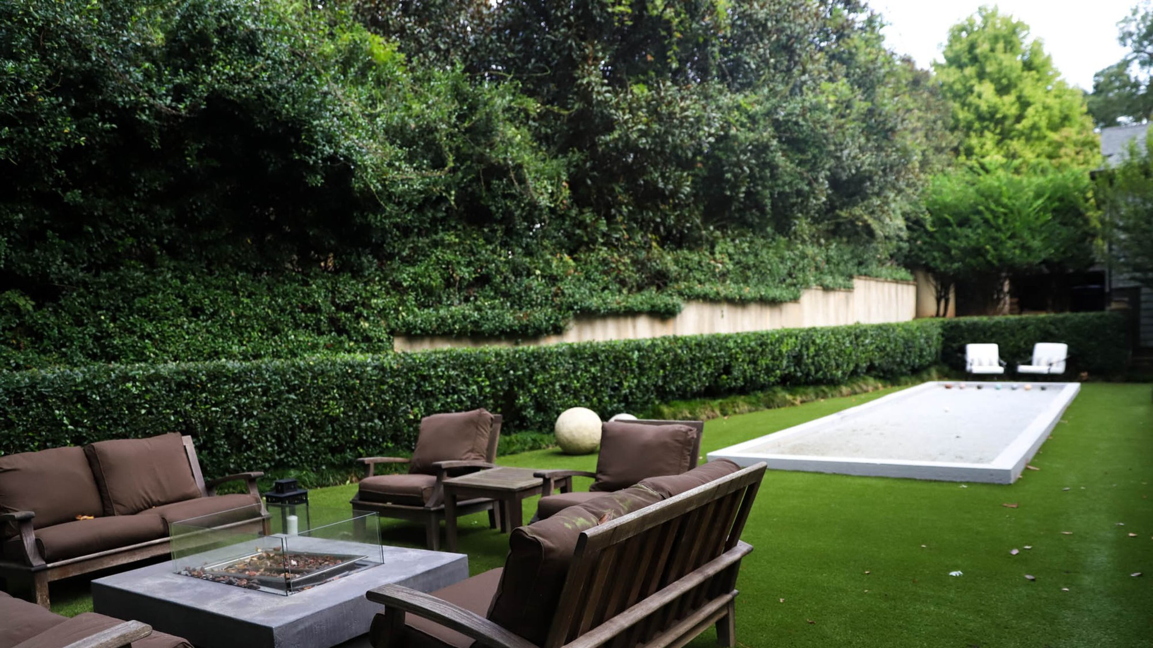 Angelo and Dana Spinola’s family loves to play bocce, so Dana worked with Green Seasons Landscaping, who does their usual landscaping, to put in a bocce court as a surprise for Angelo for Valentine’s Day. Text by Shannon Dominy. Photo by Reynolds Rogers.