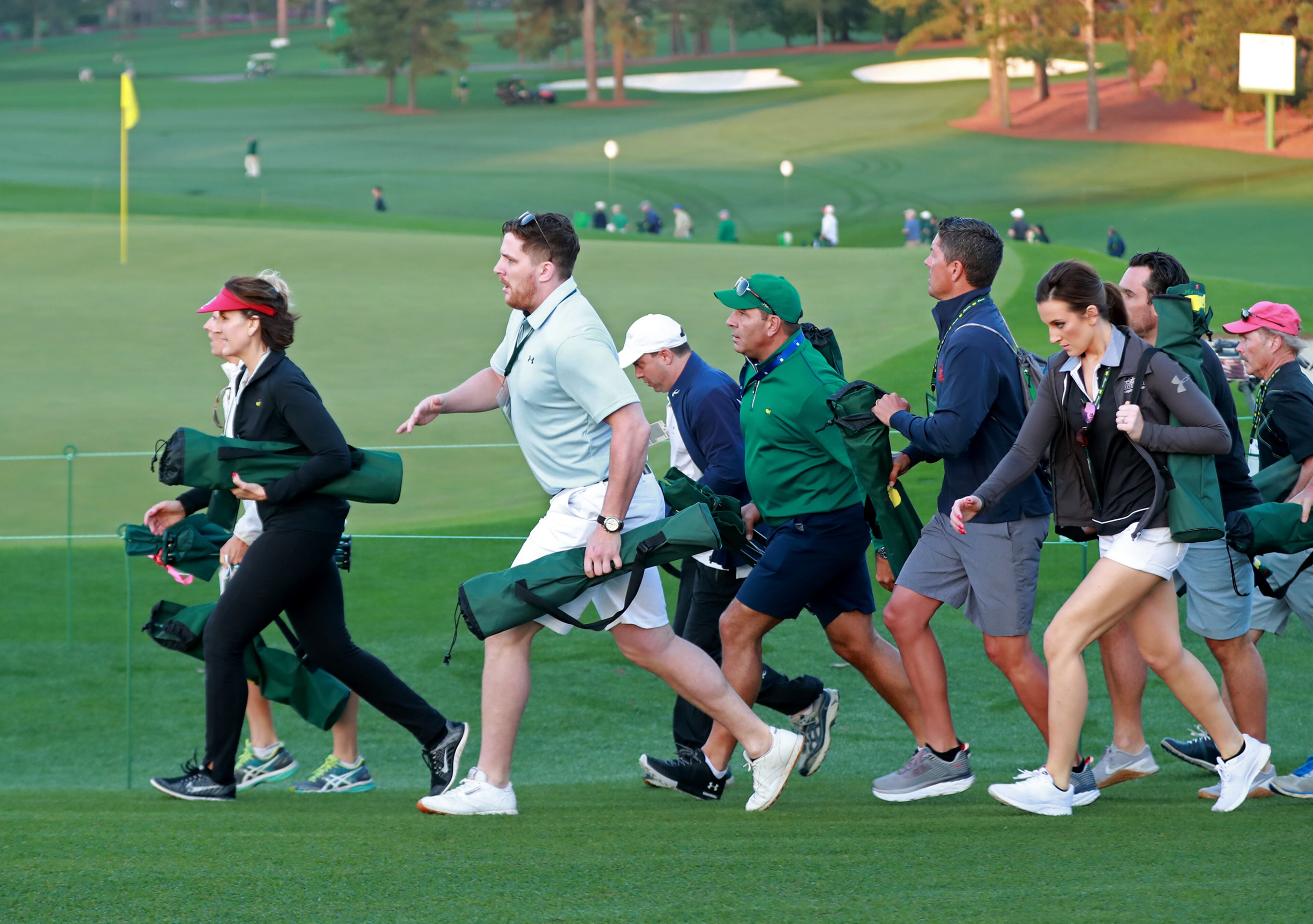 Golf patrons hit the course to claim their spots as it opens for the honorary start by Jack Nicklaus and Gary Player. (Curtis Compton/ccompton@ajc.com)