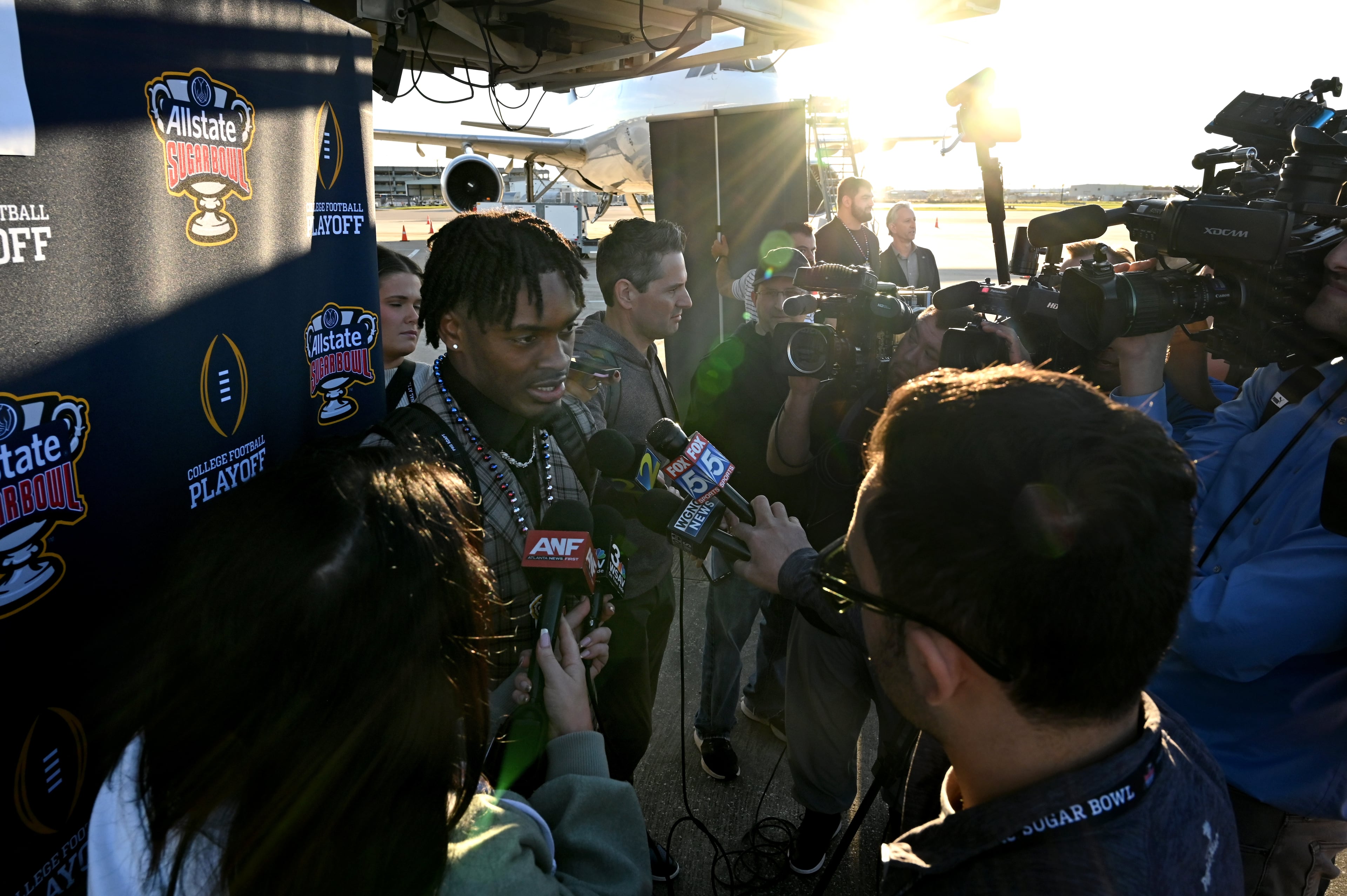 Georgia defensive line Malaki Starks speaks to members of the press as players and staff arrive ahead of the Sugar Bowl at Louis Armstrong International Airport, Sunday, Dec. 29, 2024, in New Orleans. (Hyosub Shin / AJC)