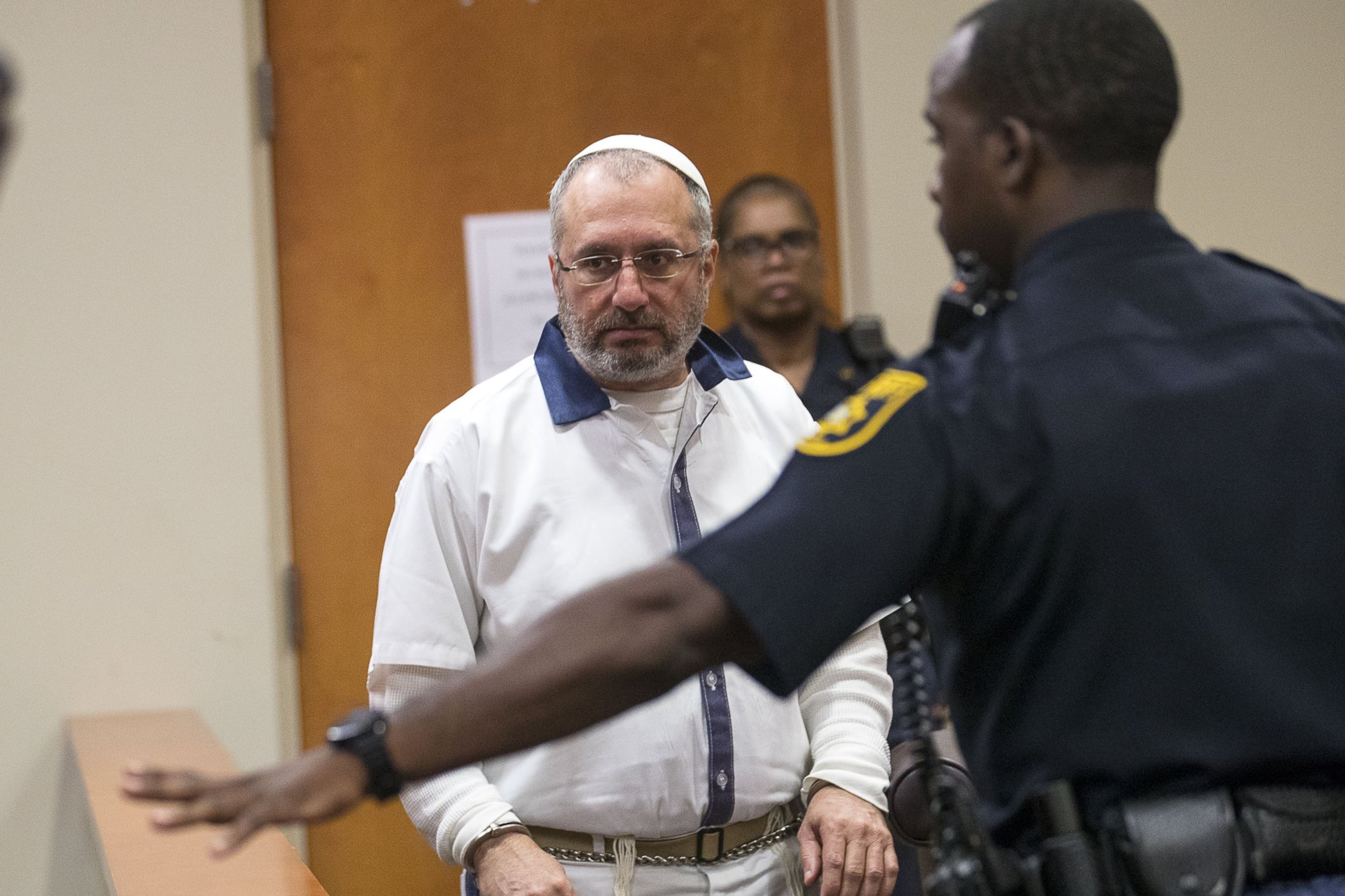 7/9/2019 — Decatur, Georgia — Hemy Neuman enters the courtroom during his motion for a new trial in front of DeKalb County Judge Gregory Adams at the DeKalb County Courthouse in Decatur, Tuesday, July 9, 2019. (Alyssa Pointer/alyssa.pointer@ajc.com)