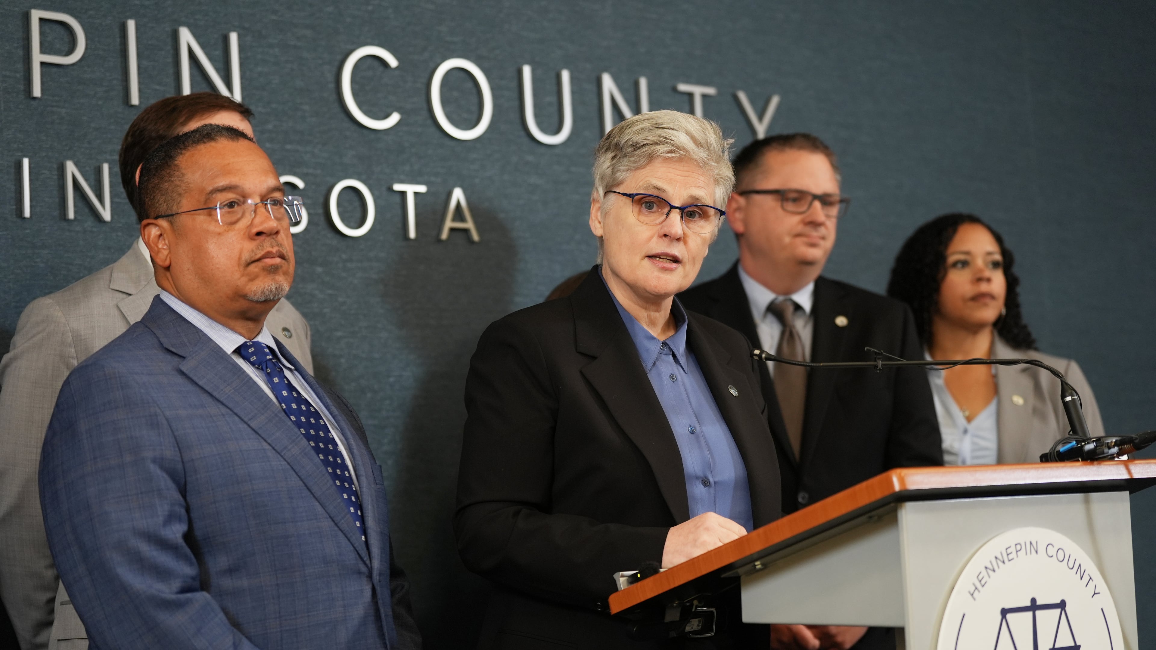 Hennepin County Attorney Mary Moriarty speaks during a news conference at the Hennepin County Government Center in Minneapolis, Minn., on Monday, May 18, 2026. Attorney General Keith Ellison stands at left. (Renée Jones Schneider/Minnesota Star Tribune via AP)