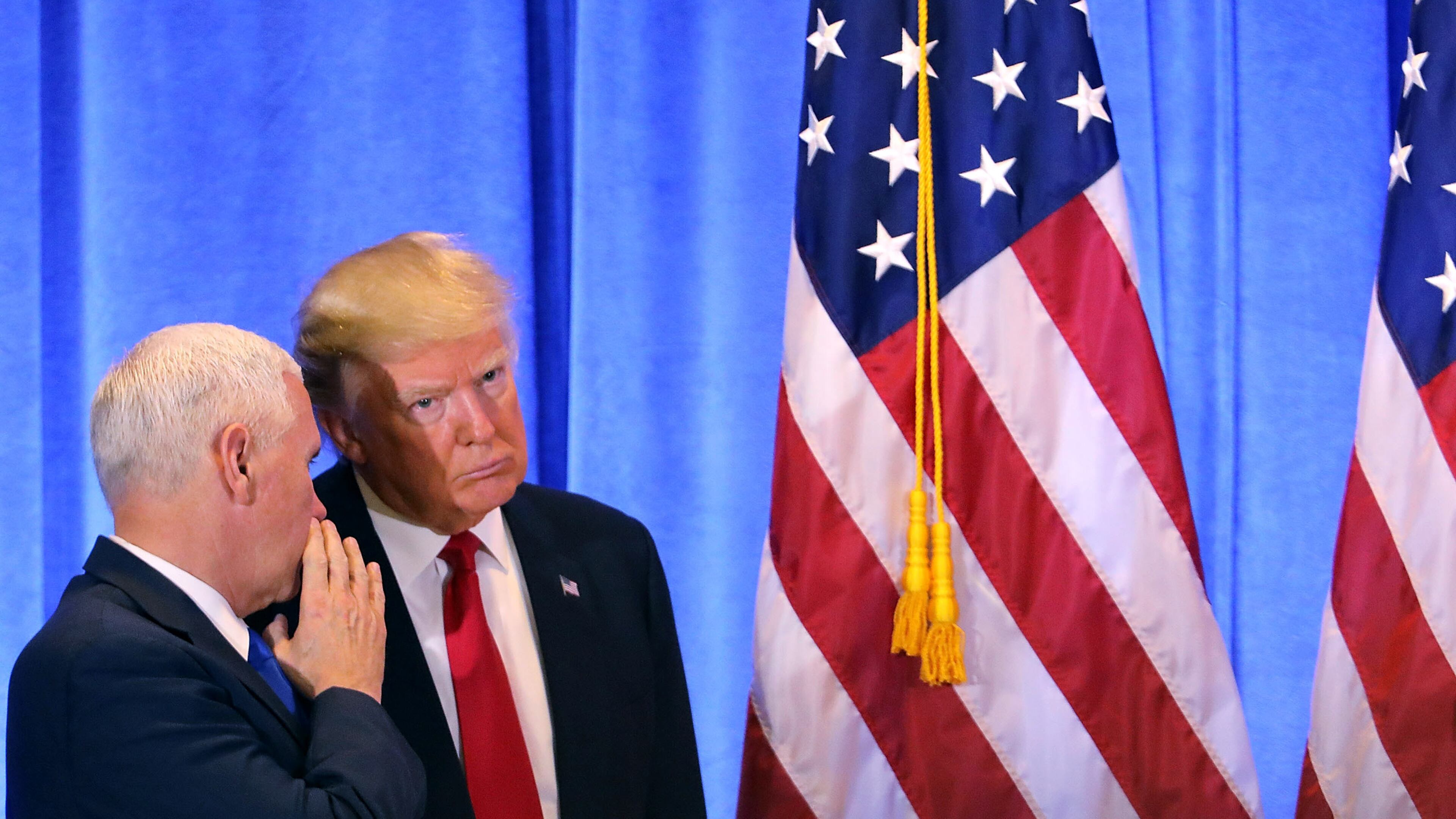 NEW YORK, NY - JANUARY 11: President-elect Donald Trump stands with Vice President-elect Mike Pence at a news conference at Trump Tower on January 11, 2017 in New York City. This is Trump's first official news conference since the November elections. (Photo by Spencer Platt/Getty Images)