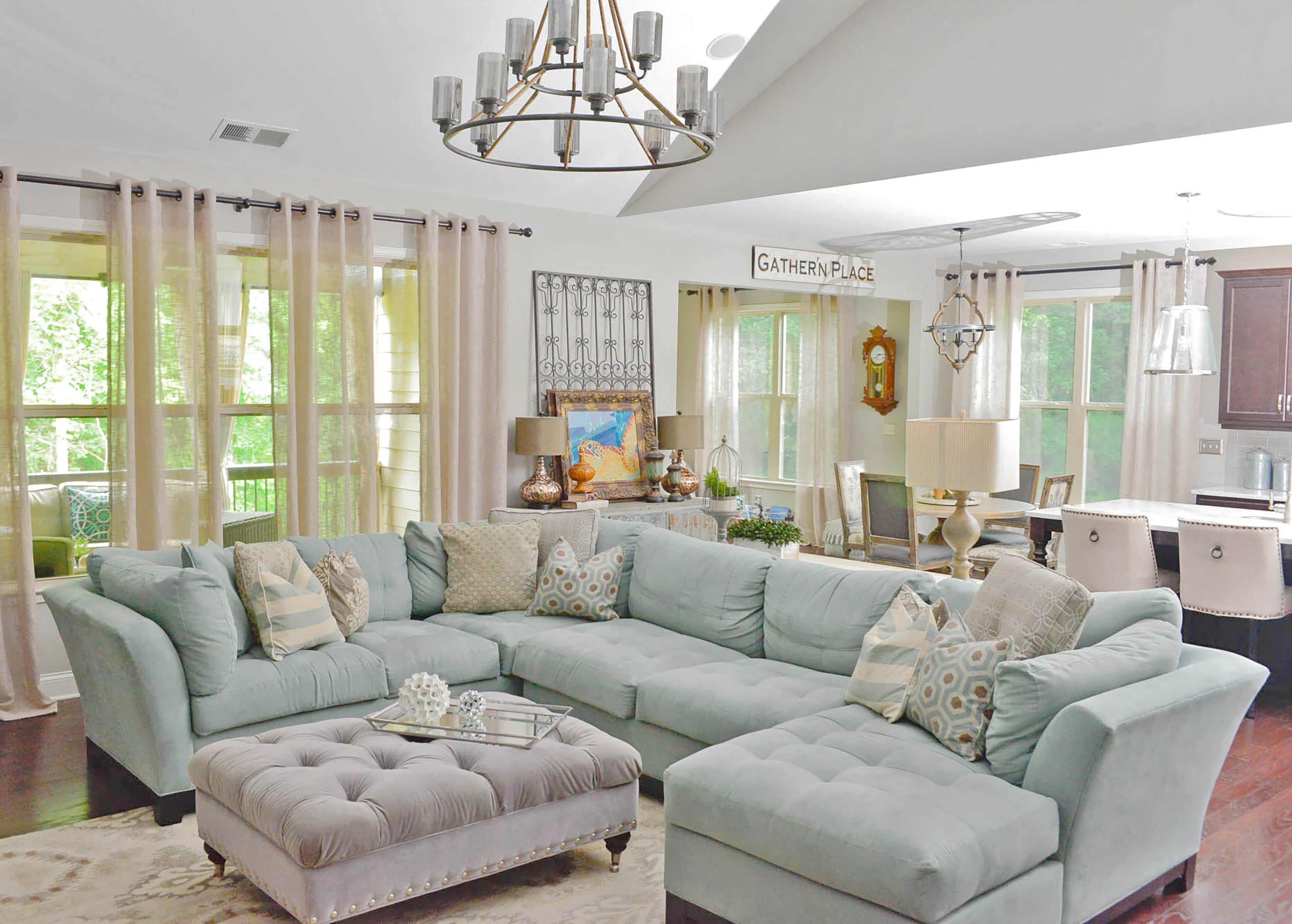 The living room combines comfort with functionality. The sectional from Rooms to Go offers an abundance of seating, when guests are over, and the ability for the family to stretch out when not entertaining. Metal and industrial decor elements include the tiered round metal chandelier from Progressive Lighting, wall art, lamps and accessories such as the tray on the ottoman. Text by Lori Johnson and Kelsey E. Green/Fast Copy News Service.
(Christopher Oquendo Photography/www.ophotography.com)