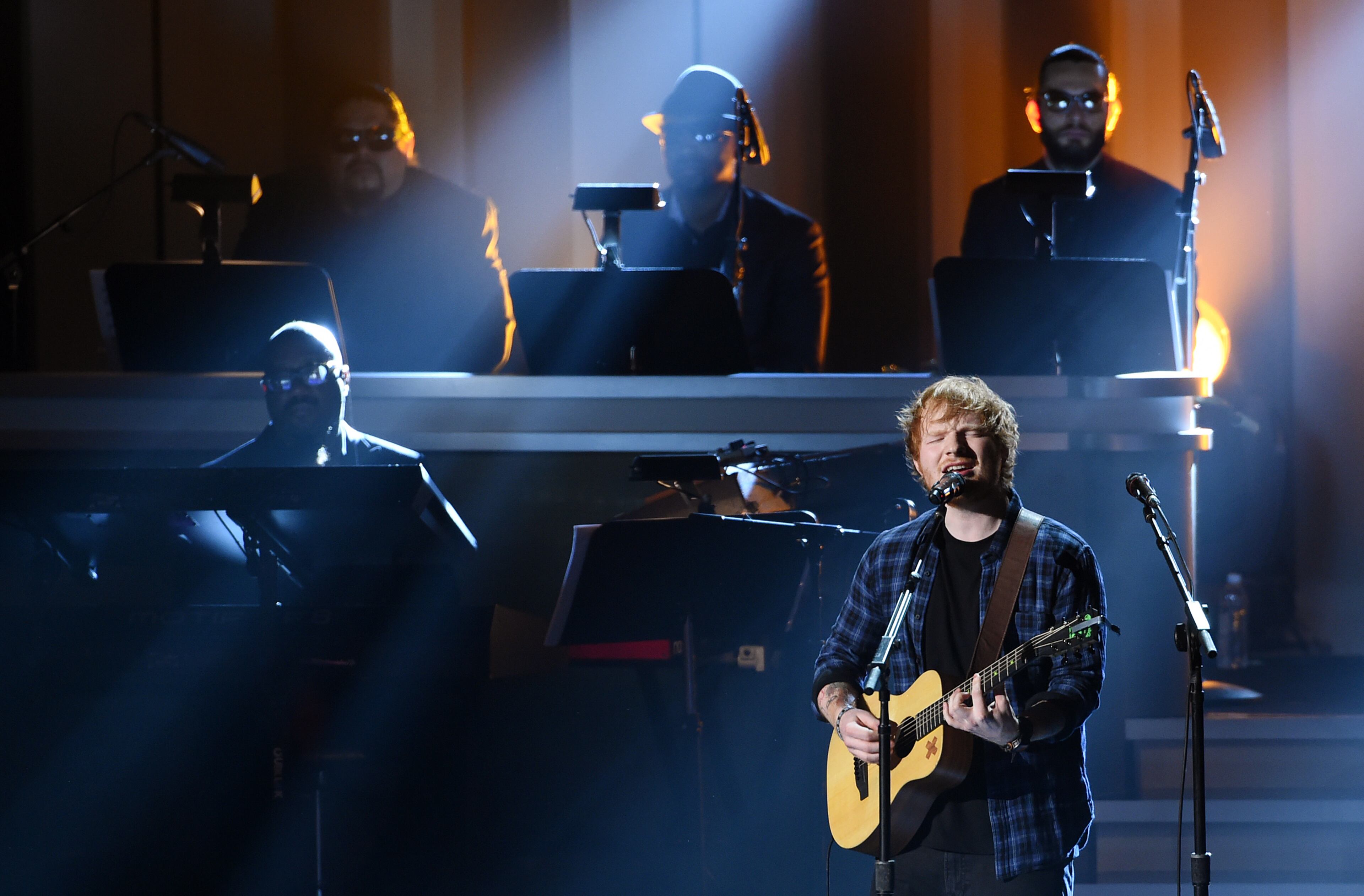 Ed Sheeran performs at "Stevie Wonder: Songs in the Key of Life - An All-Star Grammy Salute," at the Nokia Theatre L.A. Live on Tuesday, Feb. 10, 2015, in Los Angeles. (Photo by Chris Pizzello/Invision/AP)