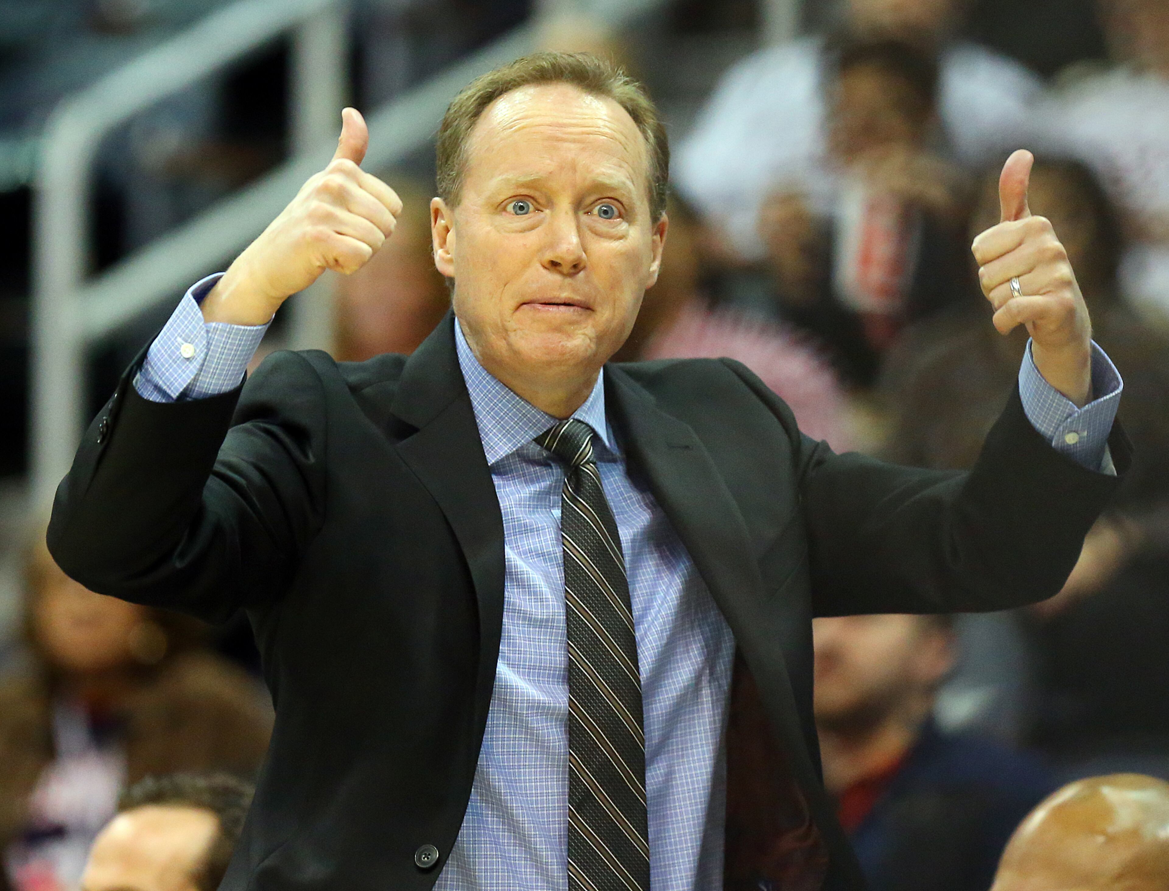 Mike Budenholzer looks for a jump ball call during a game against the Wizards on Wednesday, Feb 4, 2015 in Atlanta. Curtis Compton / ccompton@ajc.com
