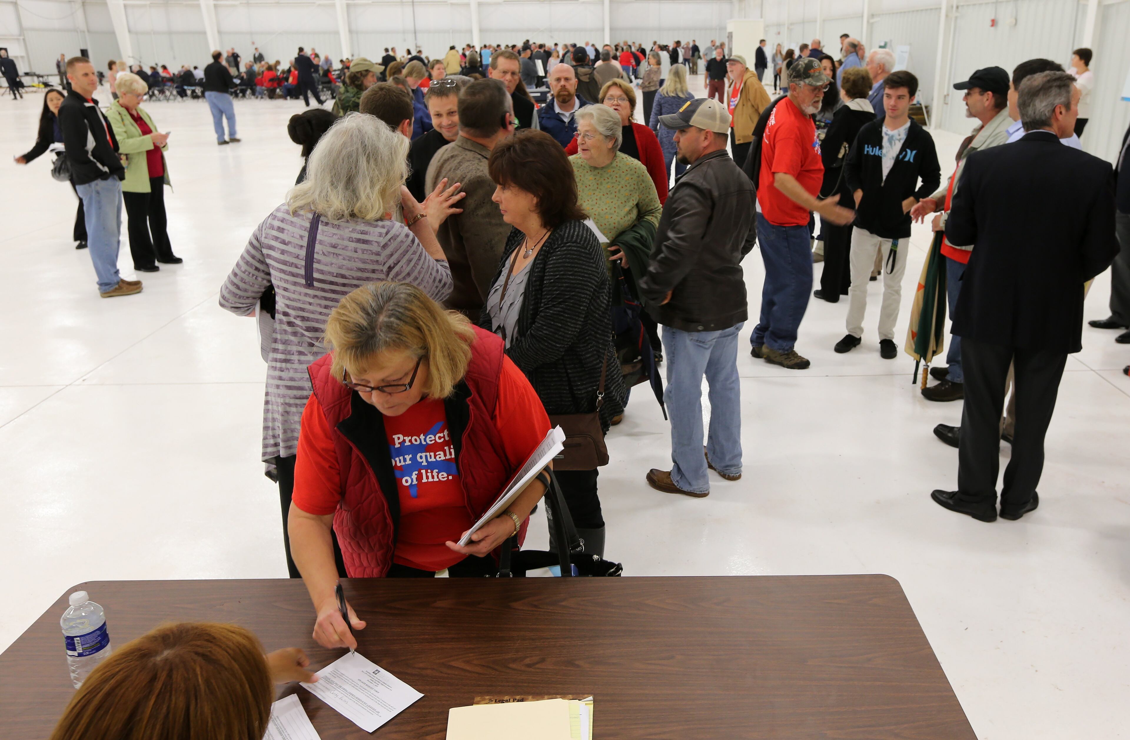 December 1, 2015 Dallas: Cathy Helms, of nearby Yorkville, signs up to speak against the commercial expansion of the airport in Paulding County before a hearing Tuesday evening December 1, 2015. More than 70 people signed up to speak on both sides of the issue. Ben Gray / bgray@ajc.com