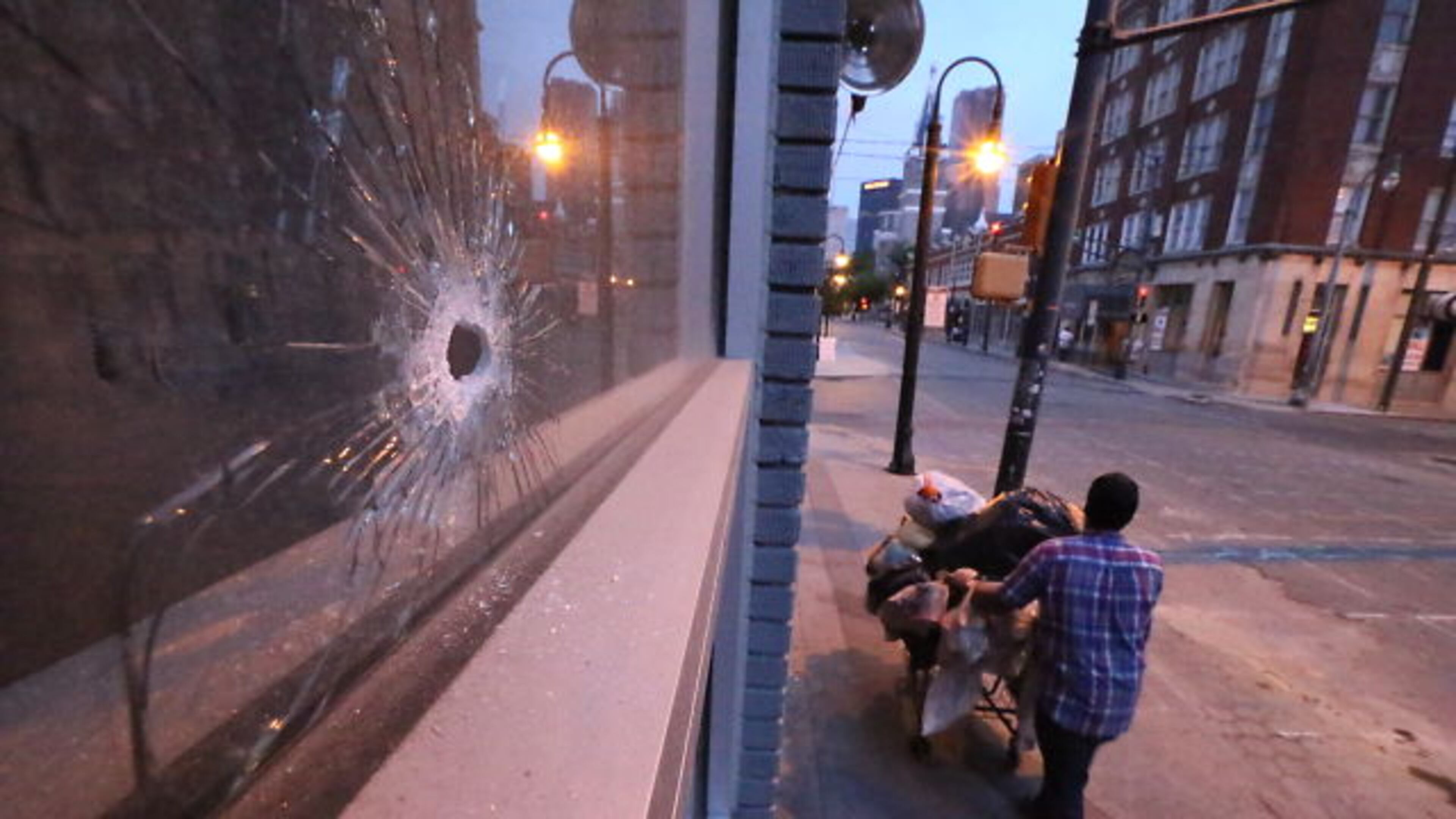 A shooting Wednesday night outside an Auburn Avenue club sent two men to the hospital with gunshot wounds. Robbery was the apparent motive in the shooting outside Pal’s Lounge at the corner of Auburn Avenue and Bell Street.