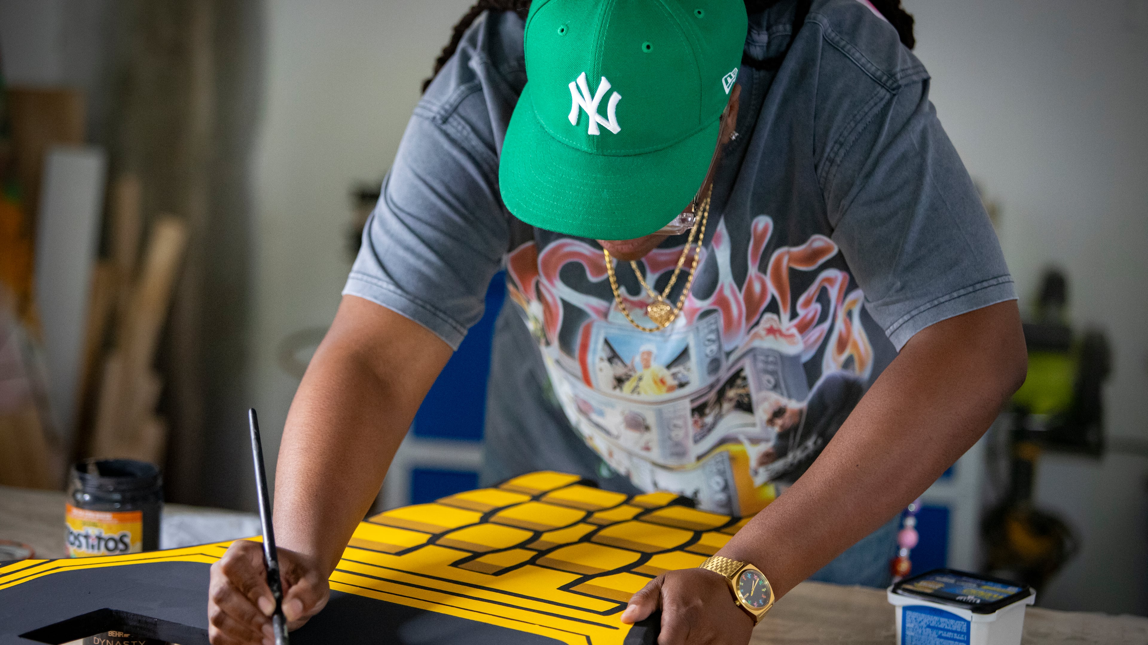 Artist Lowkey Lyss creates nostalgic woodcut artworks out of their home studio in Decatur.